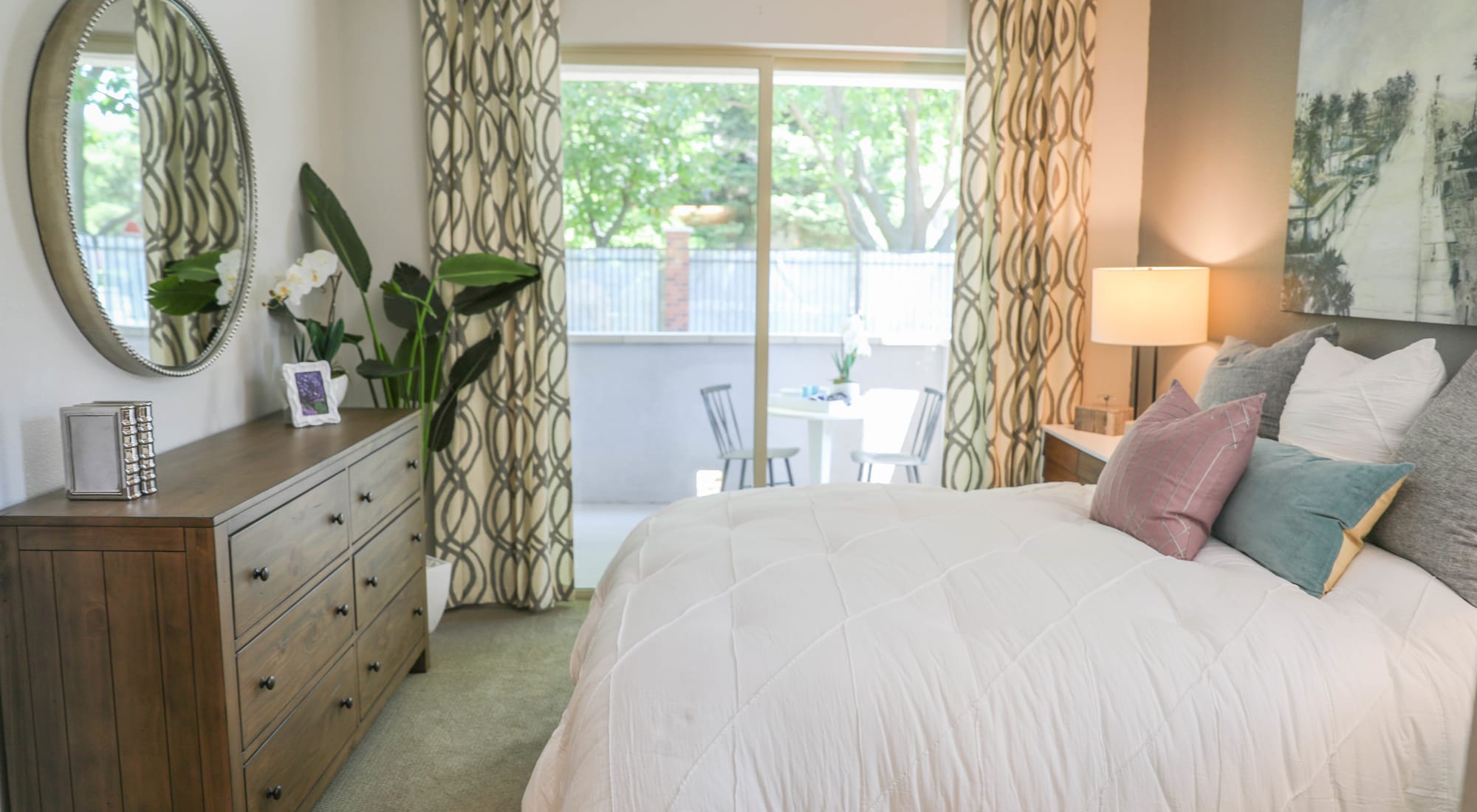 Cozy bedroom at Sutter Green Apartments in Sacramento, California