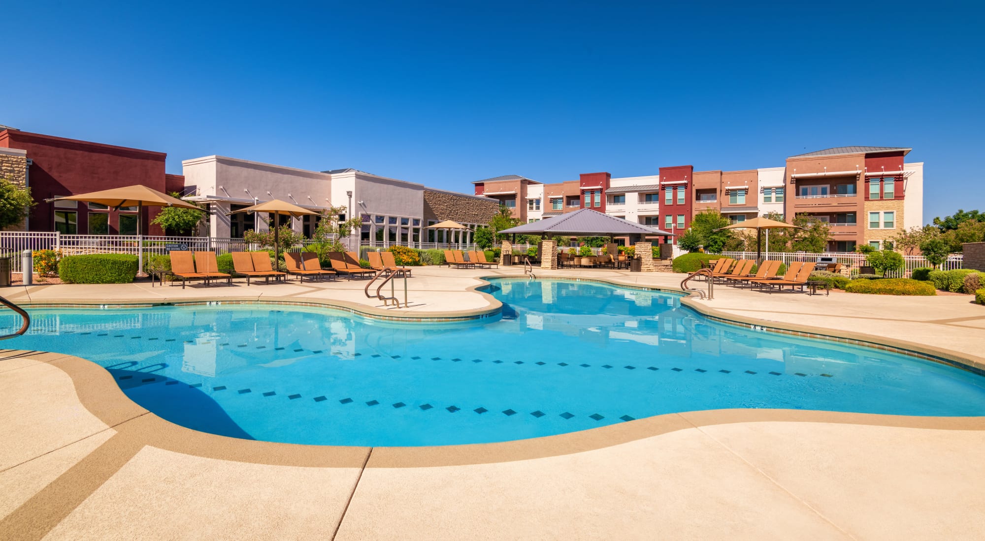 Resort-style swimming pool at Southern Avenue Villas in Mesa, Arizona