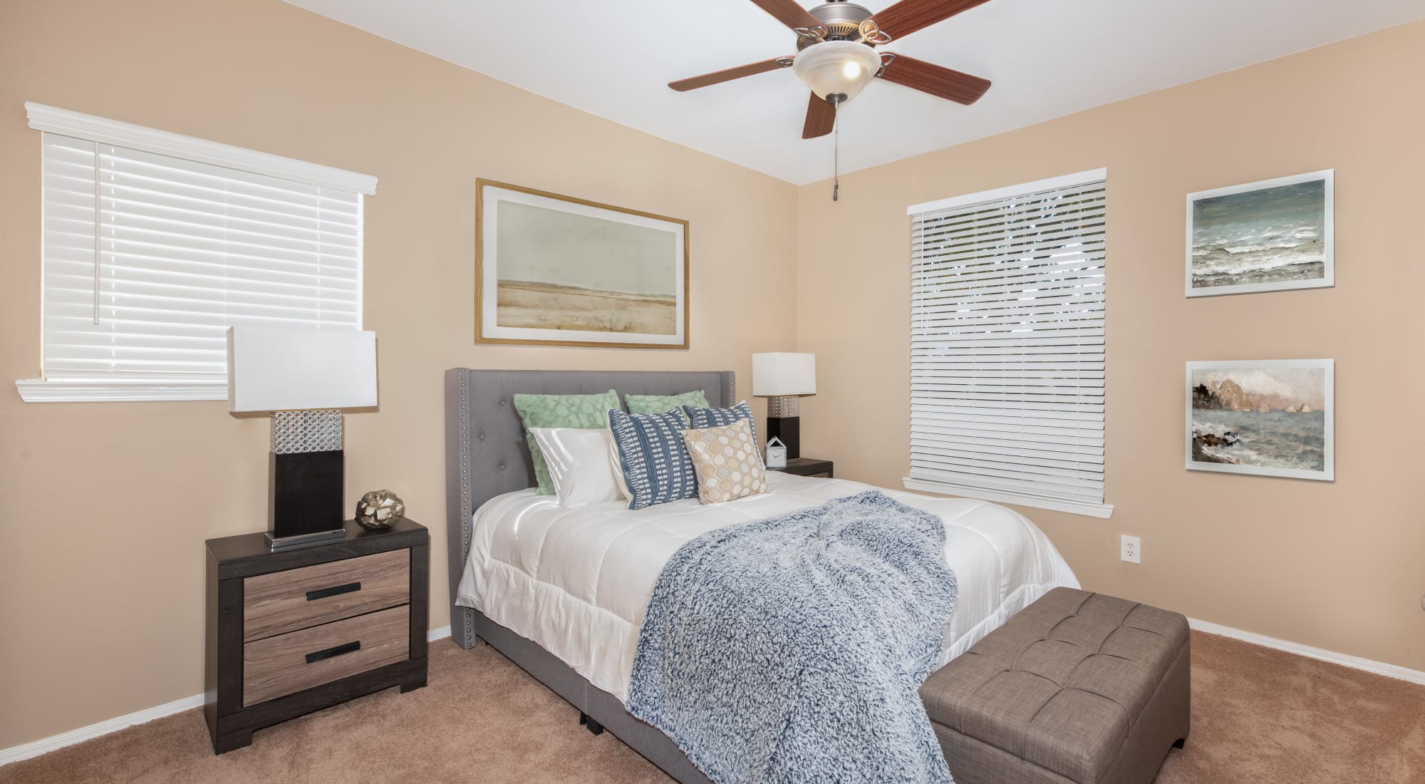 Bedroom with lighted ceiling fan at Lakeview at Parkside