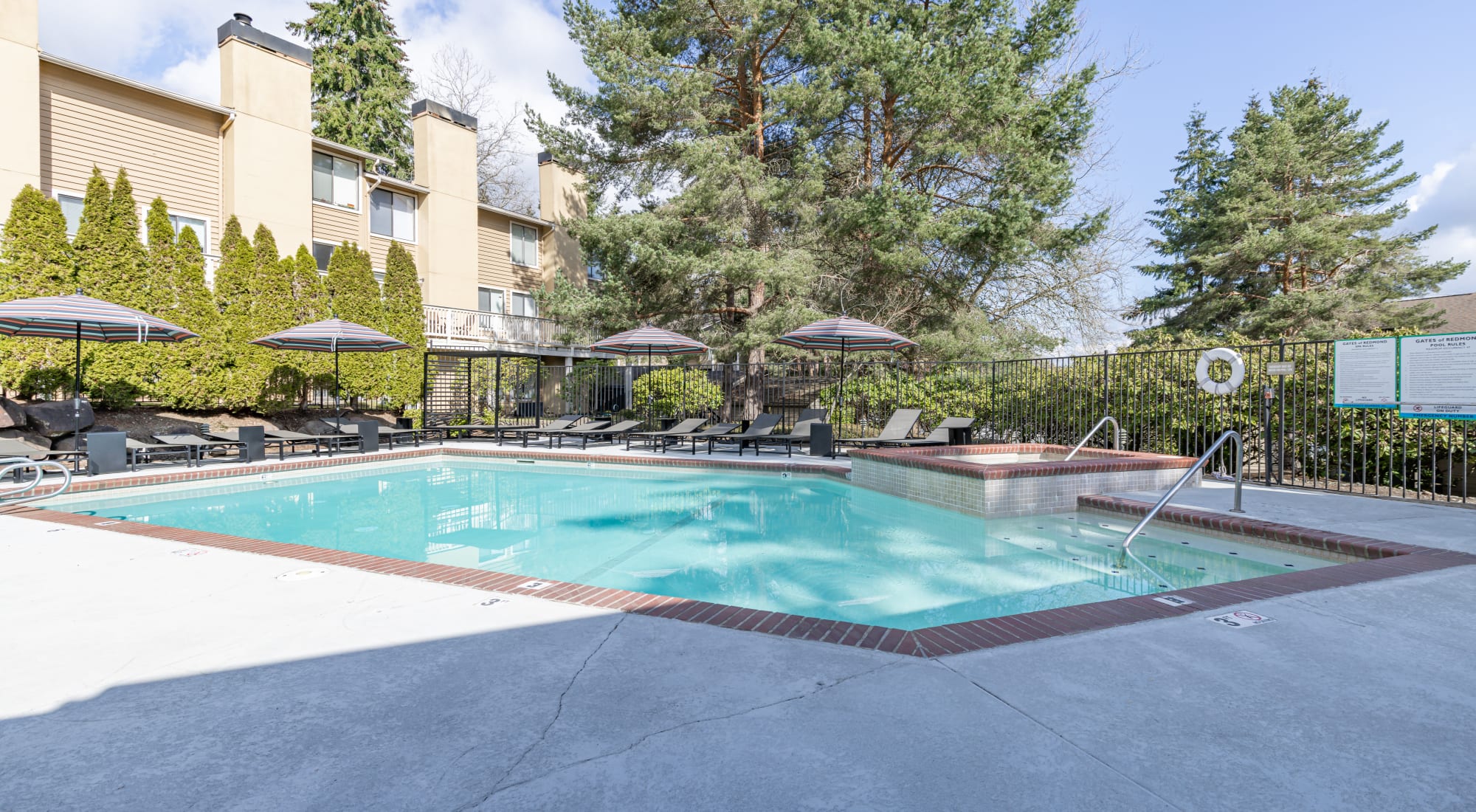 Large swimming pool on a beautiful day at The Knoll Redmond in Redmond, Washington