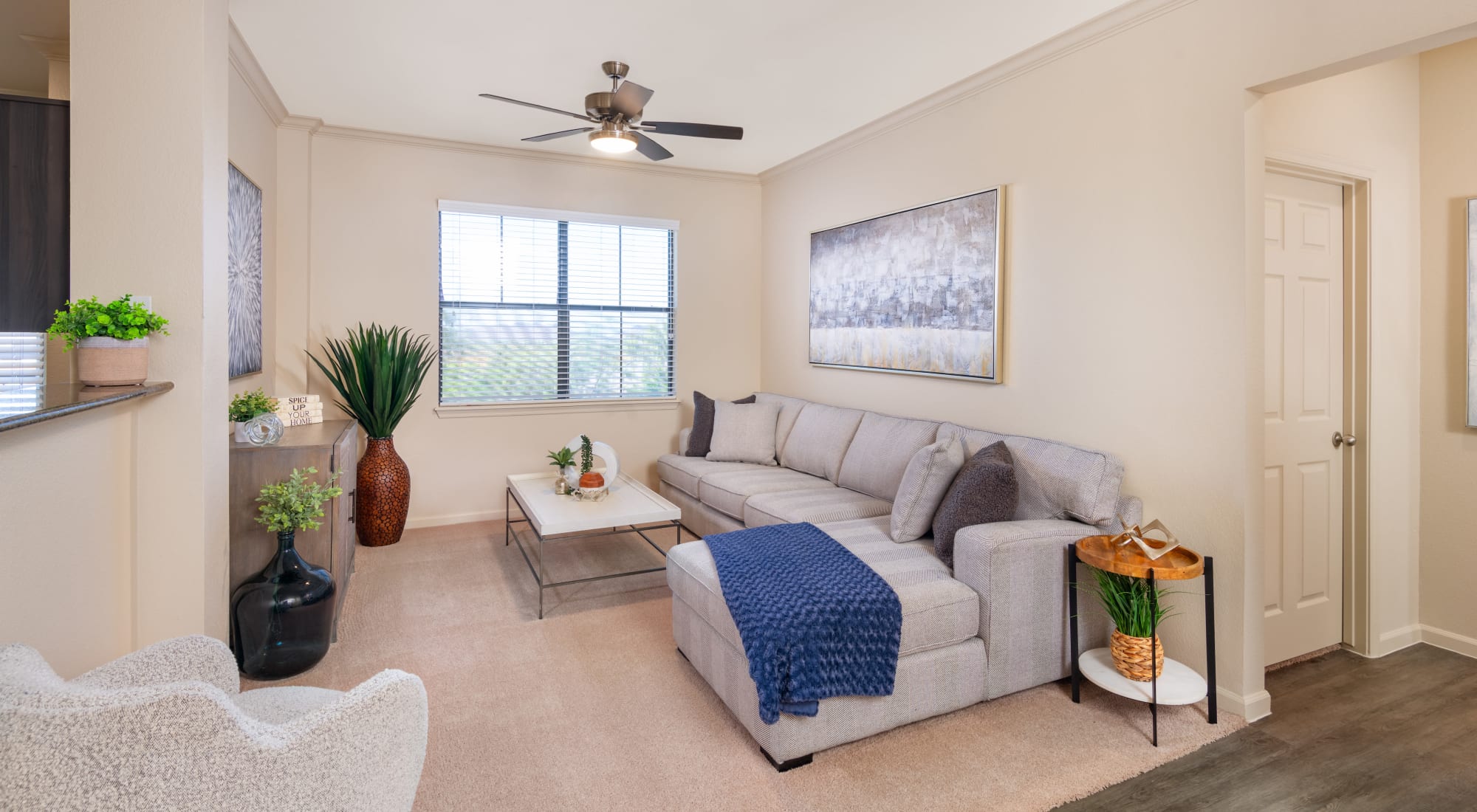 Living room with ceiling fan at Las Colinas at Black Canyon