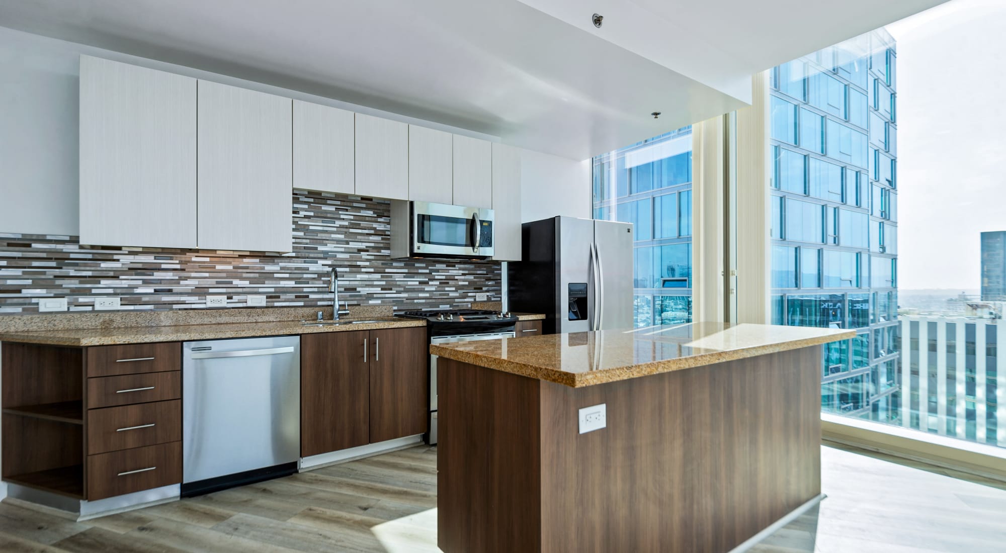 Well-lit modern kitchen at Apartments in Los Angeles, California