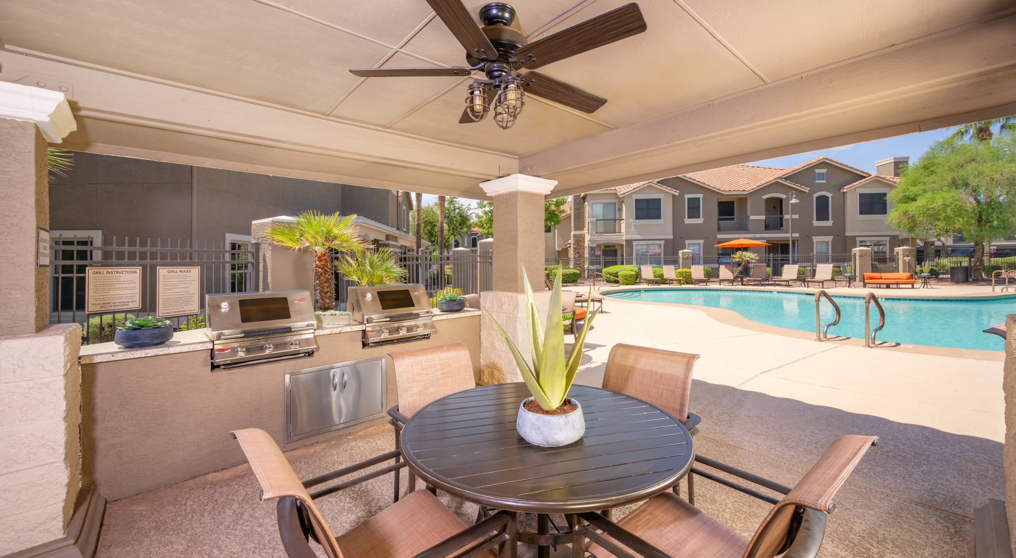 Outdoor BBQ and community space at Villas on Hampton Avenue in Mesa, Arizona 