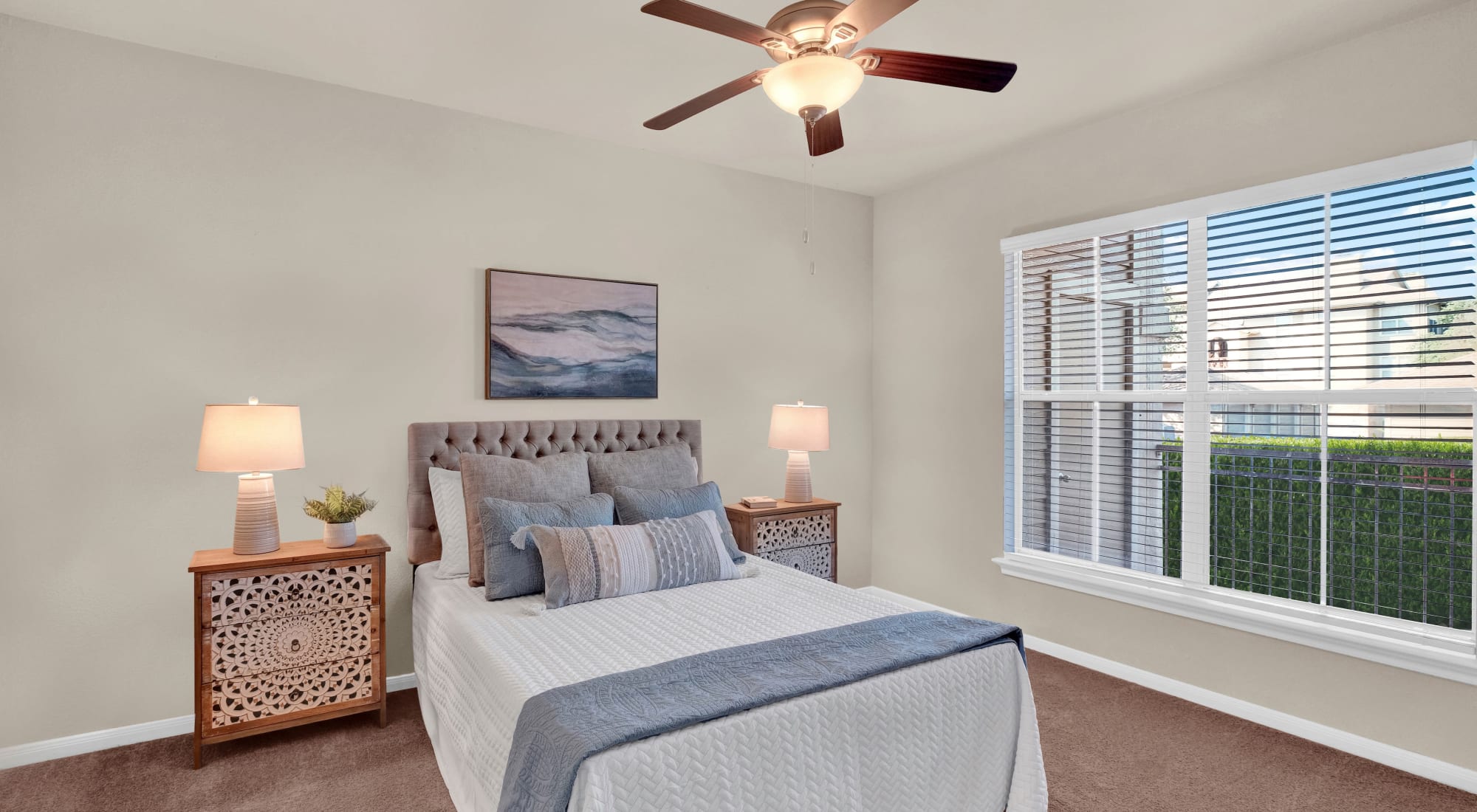Bedroom with ceiling fan at Sedona Ranch