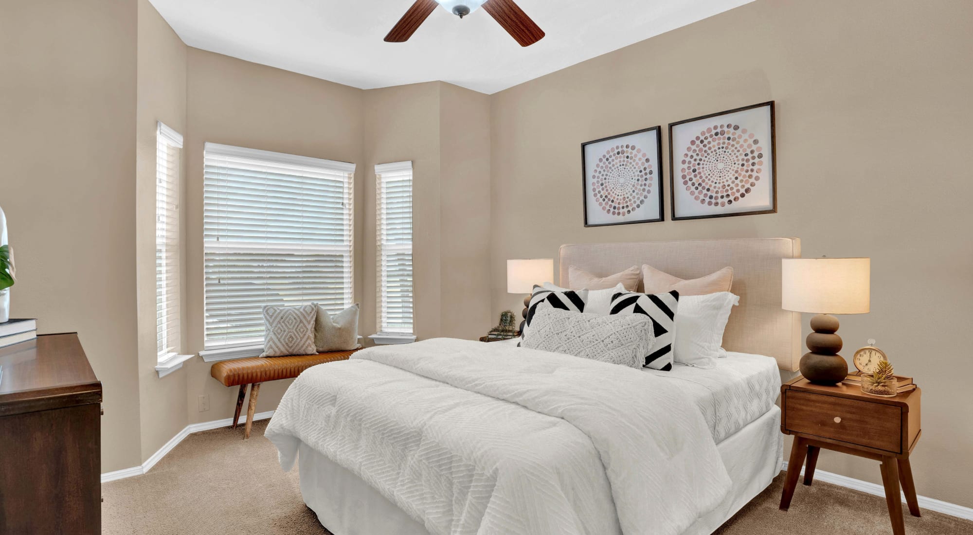 Bedroom with ceiling fan at Villas of Preston Creek