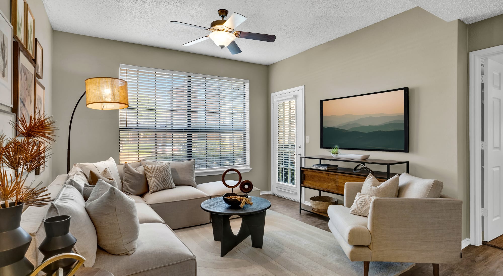 Living Room with ceiling fan at Carrollton Park of North Dallas