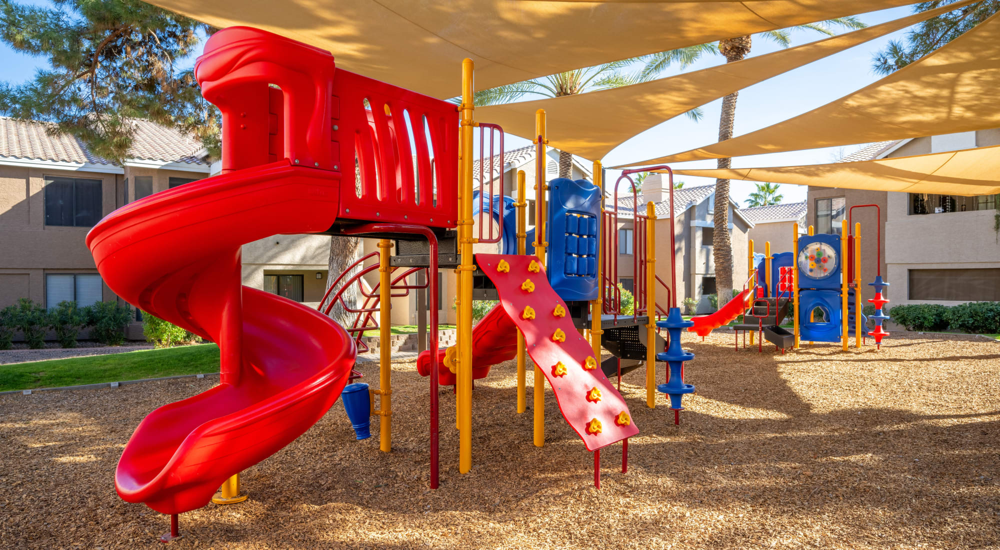 Playground with Shade Sail at The Palisades in Paradise Valley 