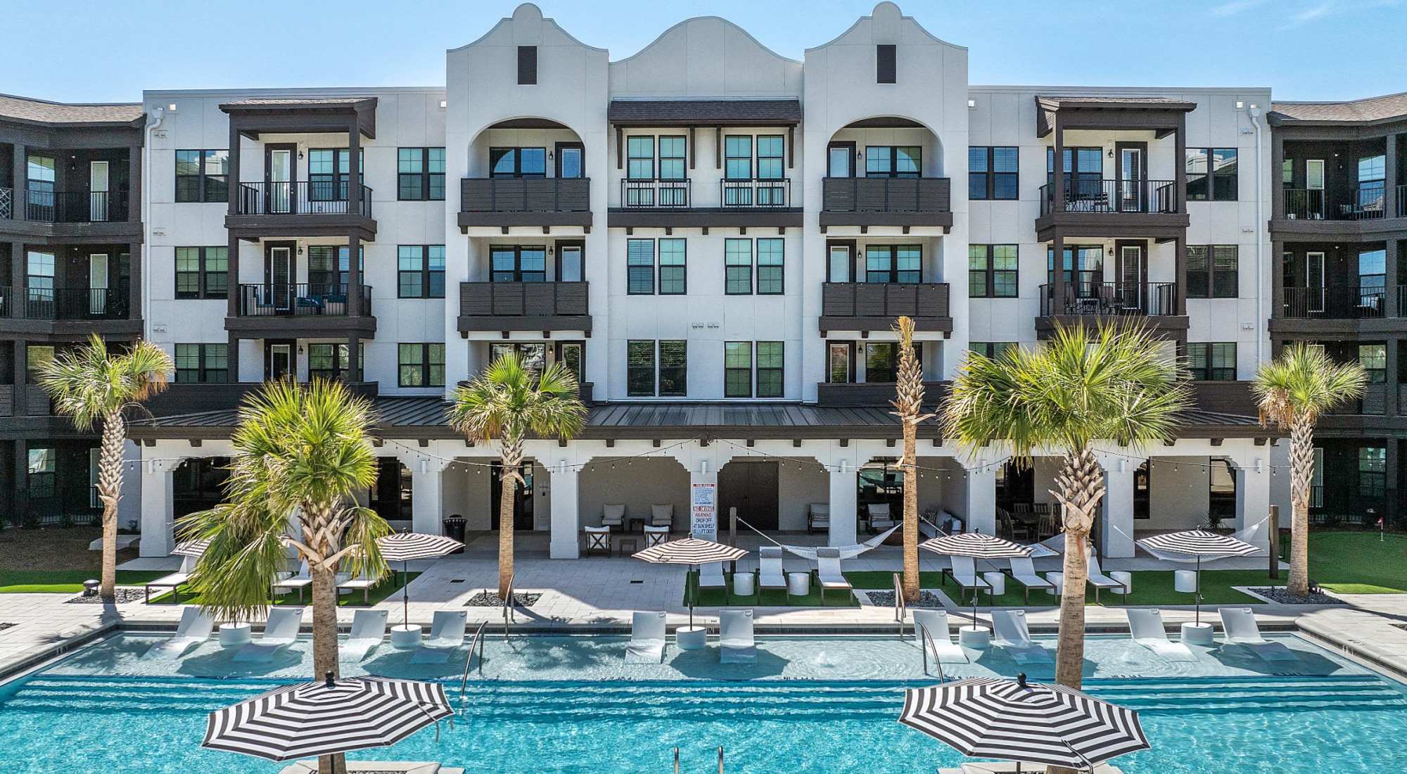 Resort-style swimming pool at Palmilla | Luxury Apartments & Townhomes in Pensacola, Florida