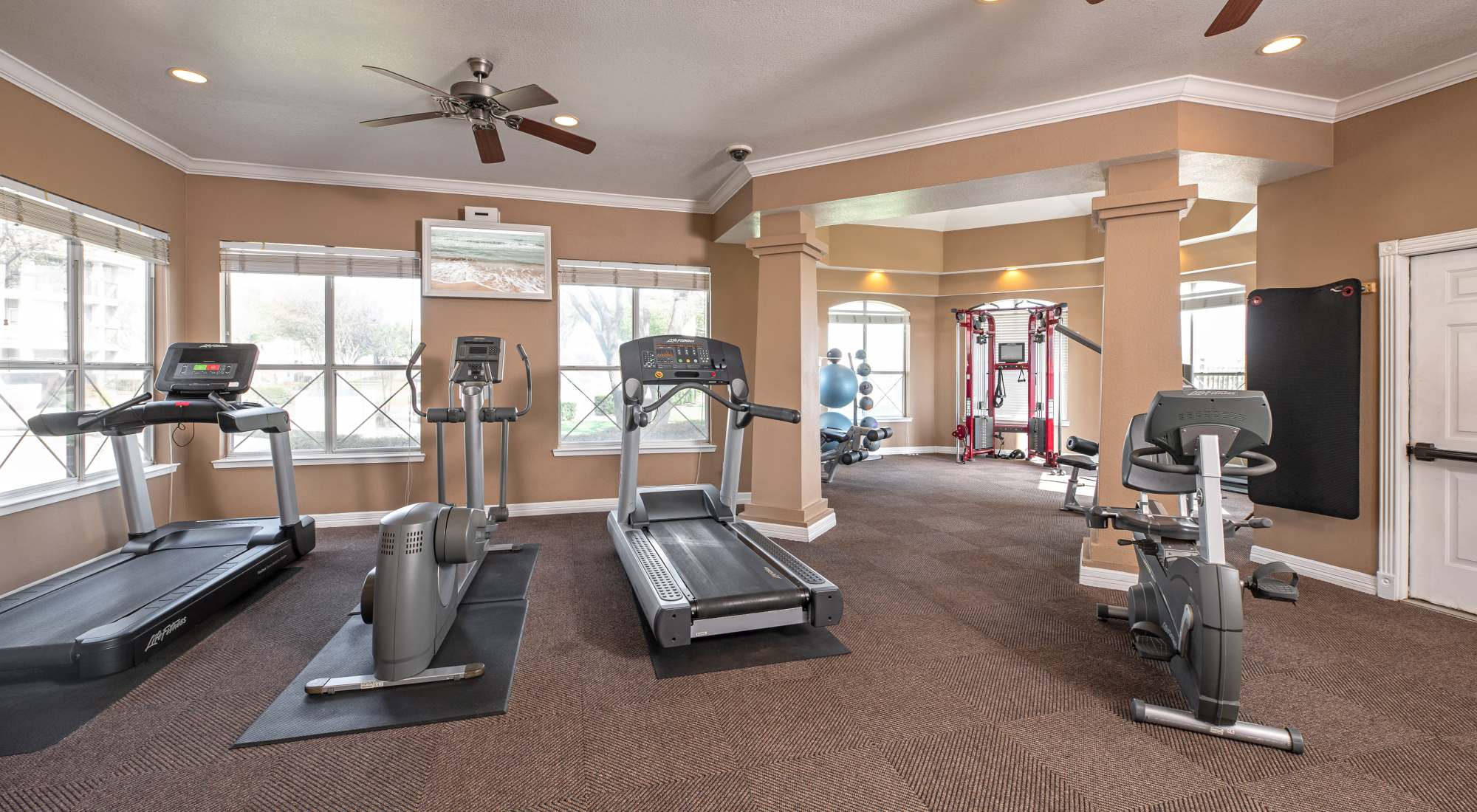Fitness center at Crescent Cove at Lakepointe in Lewisville, Texas