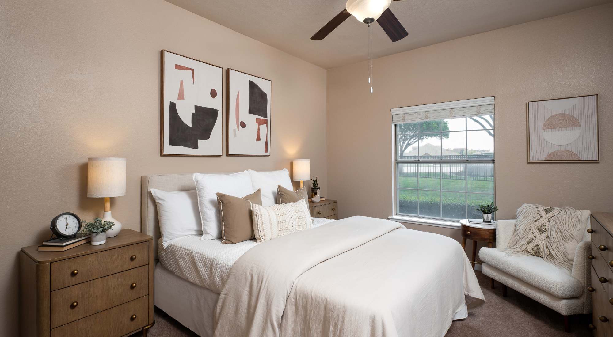 Bedroom with ceiling fan at Crescent Cove at Lakepointe