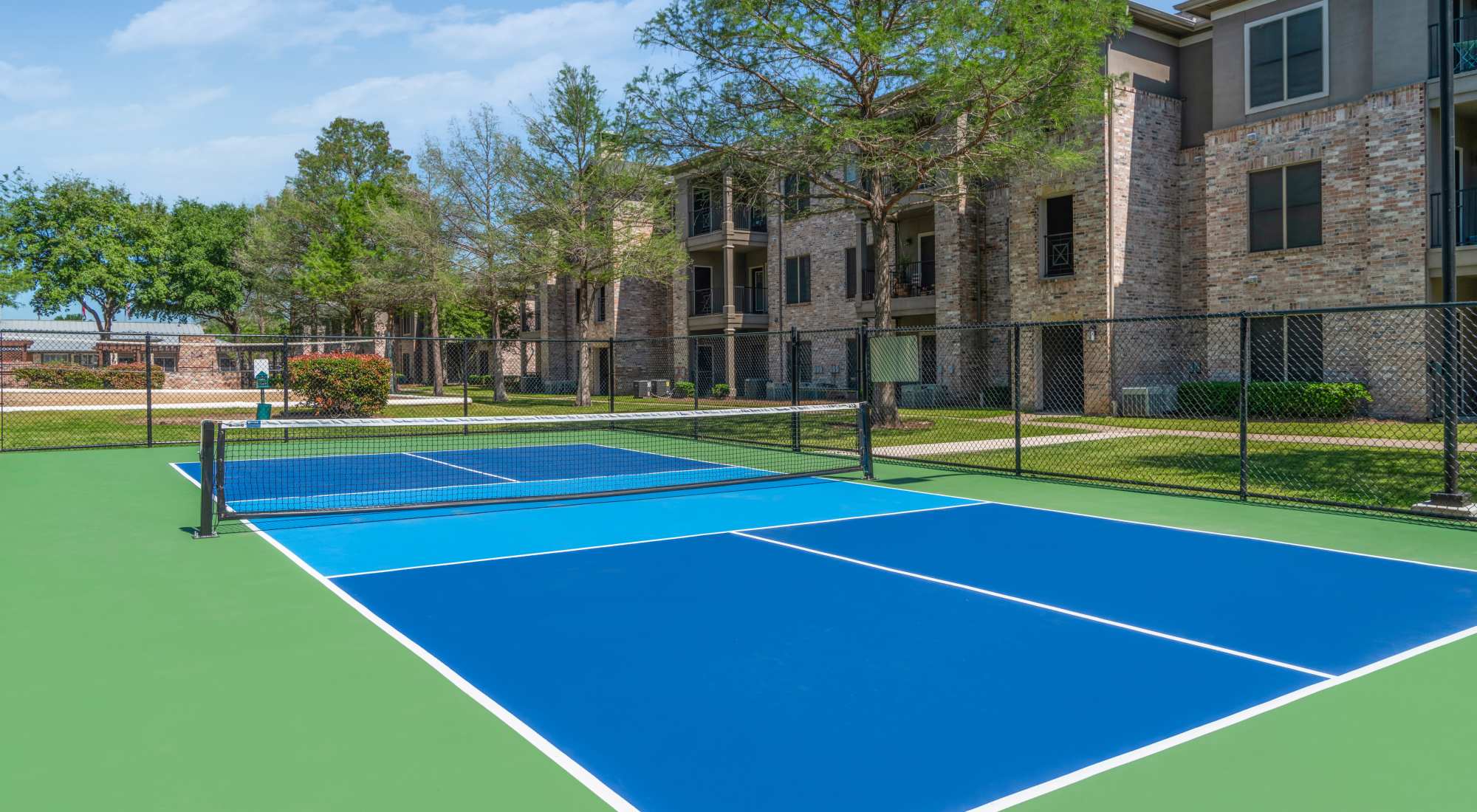Lighted pickleball court at The Springs of Indian Creek