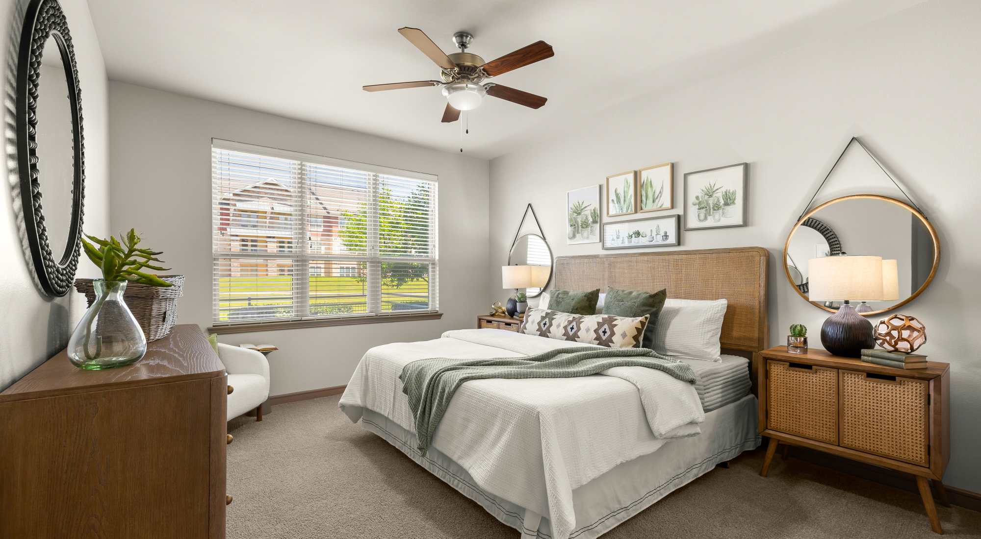 Spacious bedroom with large window at Estates of Richardson in Richardson, Texas
