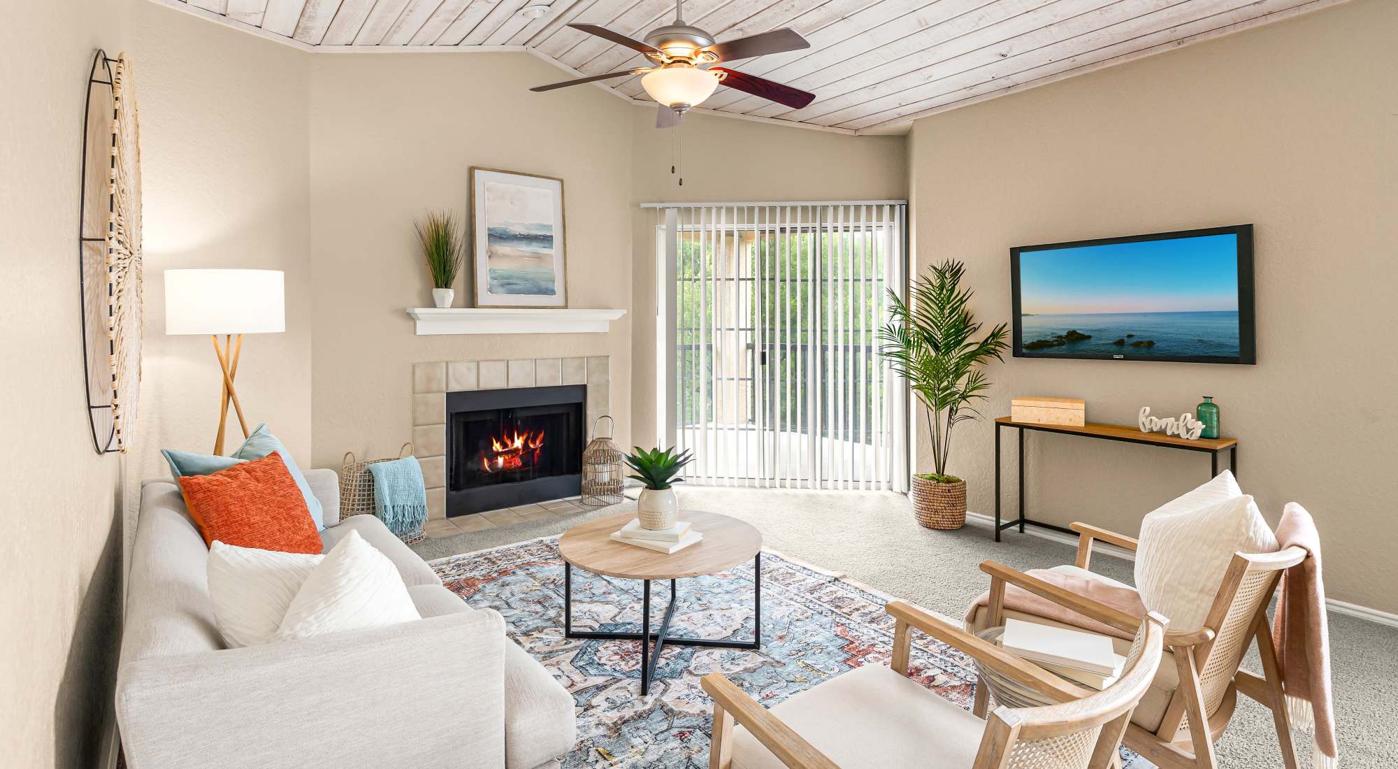 Living room with view of dining room at Villas at Oakwell Farms