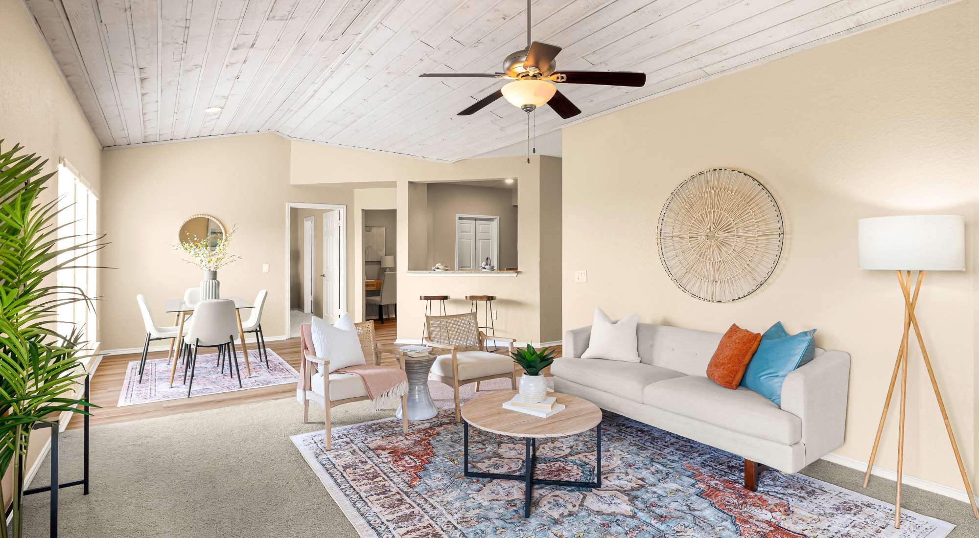 Living room with view of dining room at Villas at Oakwell Farms
