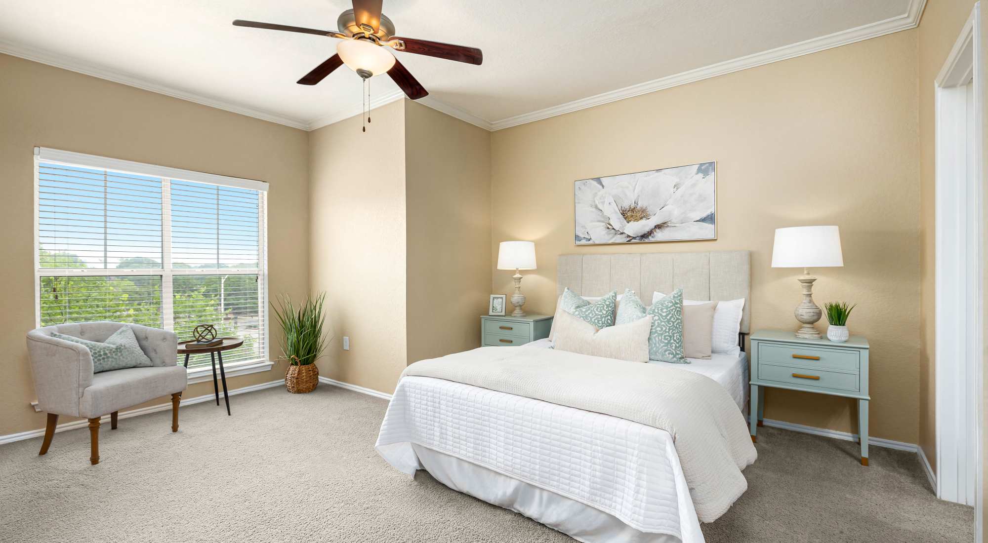 Bedroom with ceiling fan at Villas at Oakwell Farms