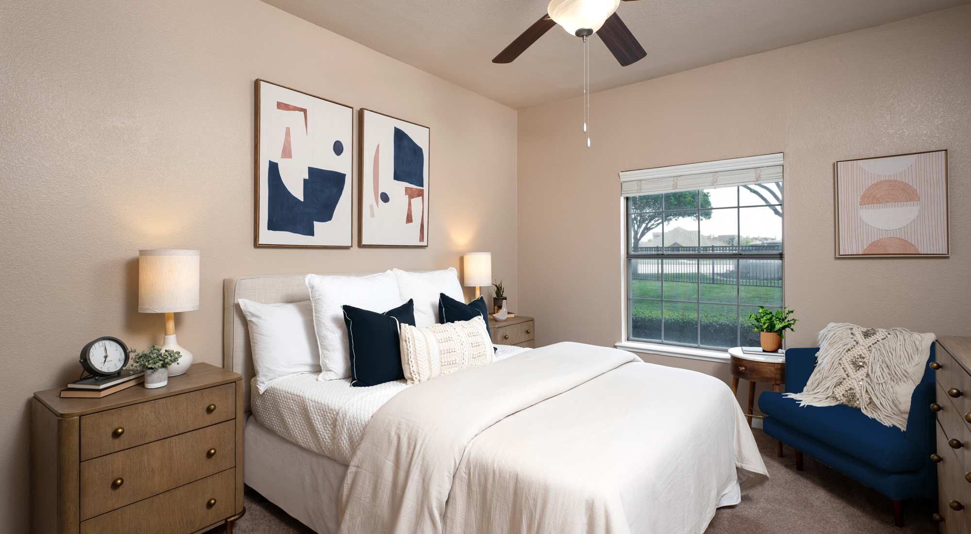 Bedroom with ceiling fan at Crescent Cove at Lakepointe