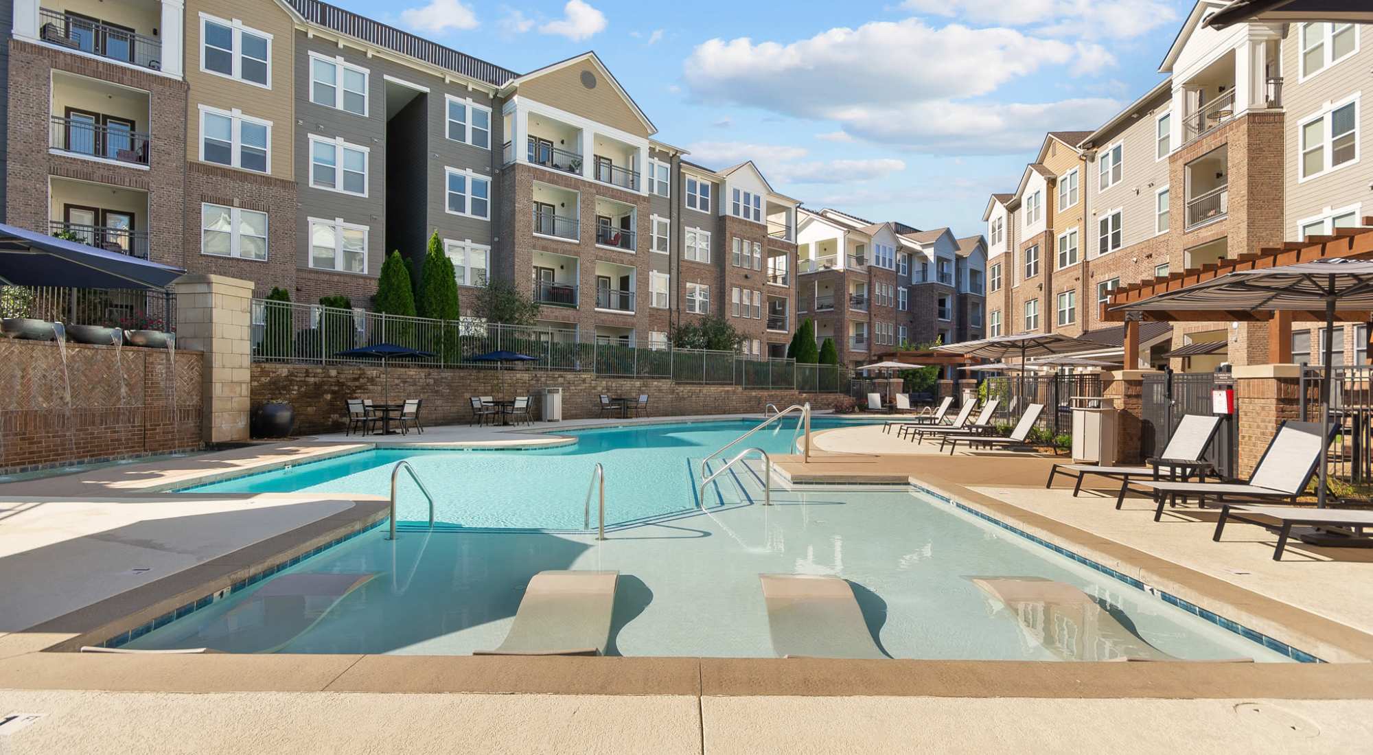 Outdoor Swimming Pool With Lounge Chairs at Artessa in Franklin, Tennessee