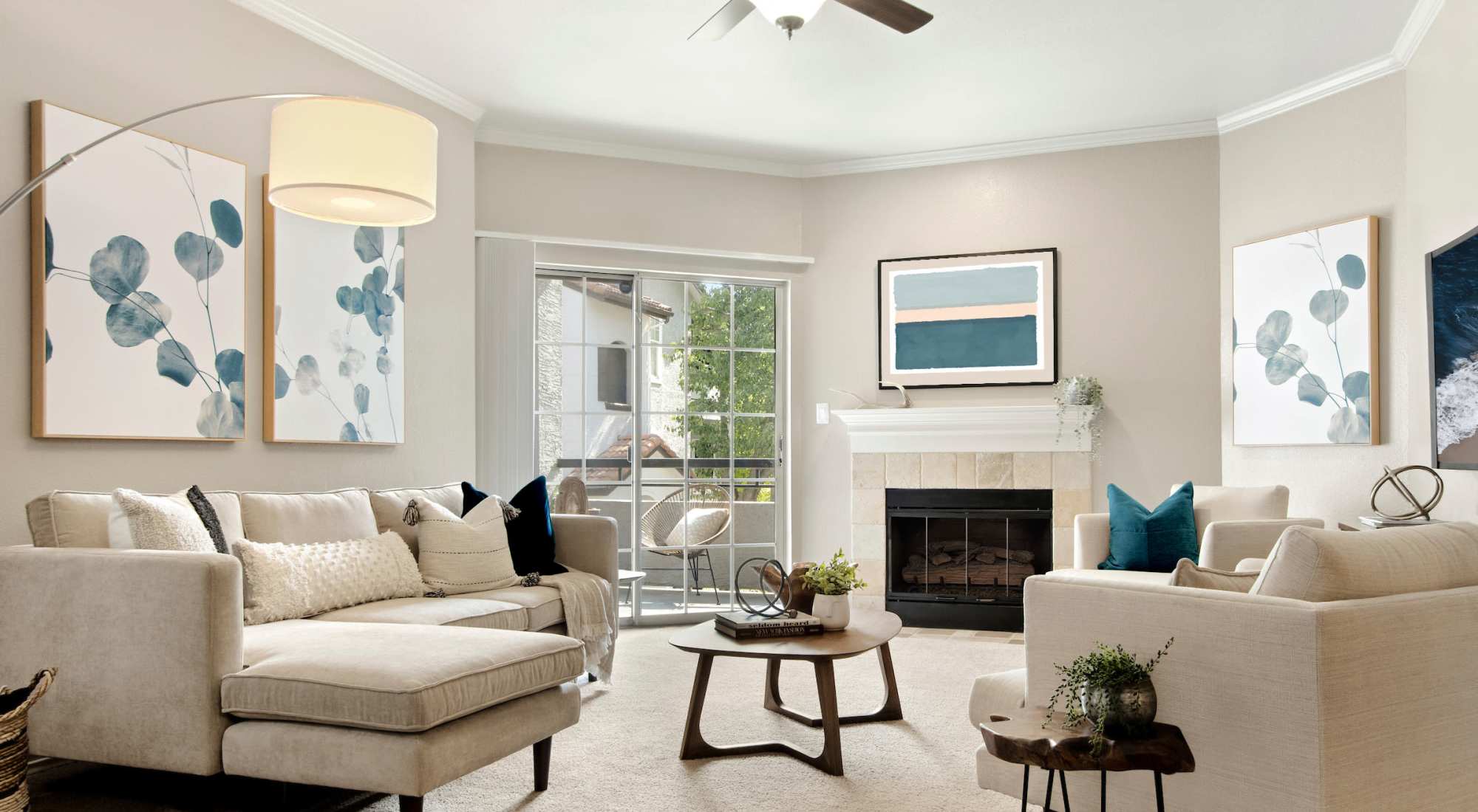 Living room with ceiling fan at Rancho Palisades in Dallas, Texas