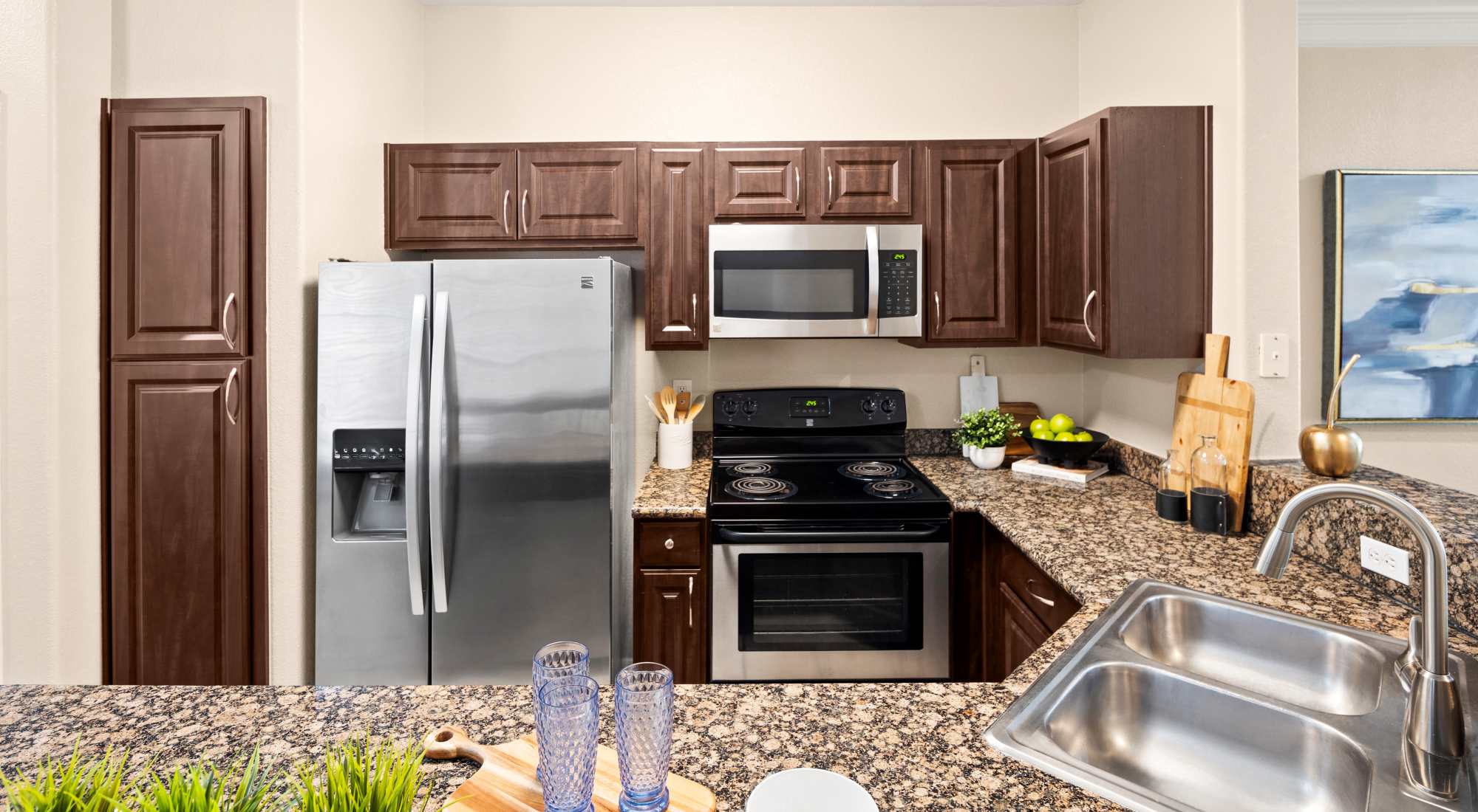 Kitchen with Stainless steel appliances at Villas at Parkside