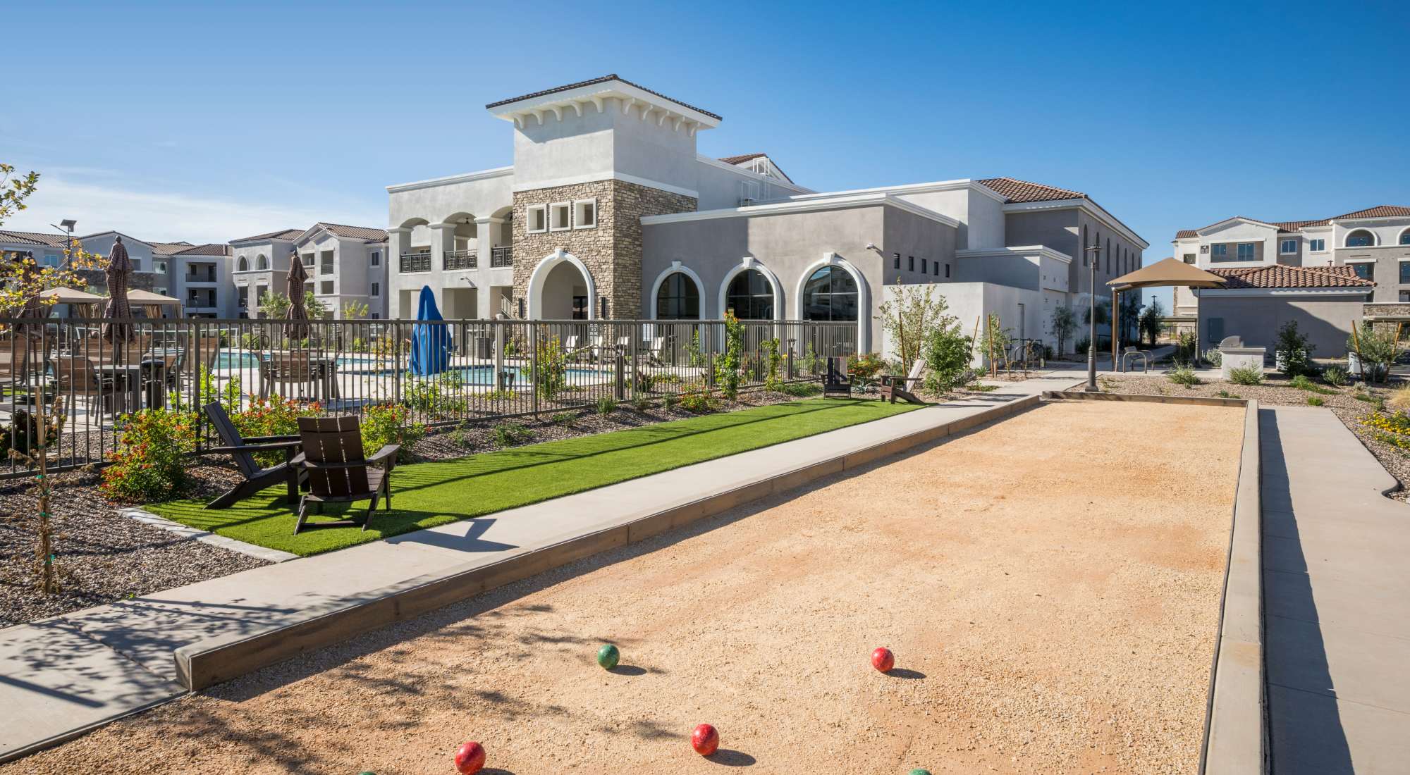 Bocce Ball with view of swimming pool at Tuscany at Gabriella Pointe in Gilbert, Arizona