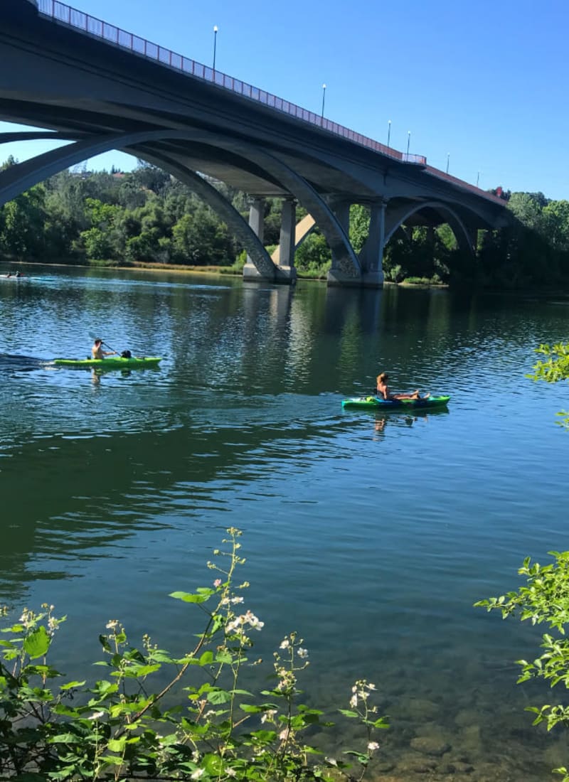 Residents kayaking near The Fairmont at Willow Creek in Folsom, California