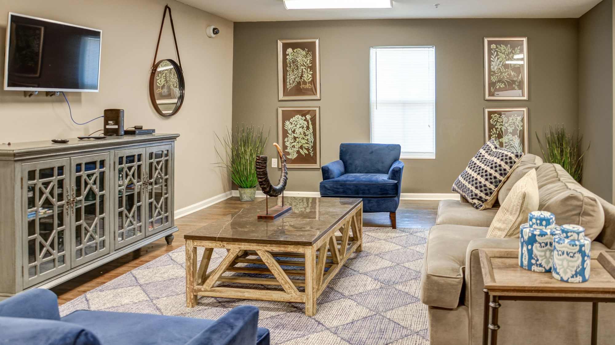 Spacious clubhouse with a TV at The Banks At Berkley in Norfolk, Virginia