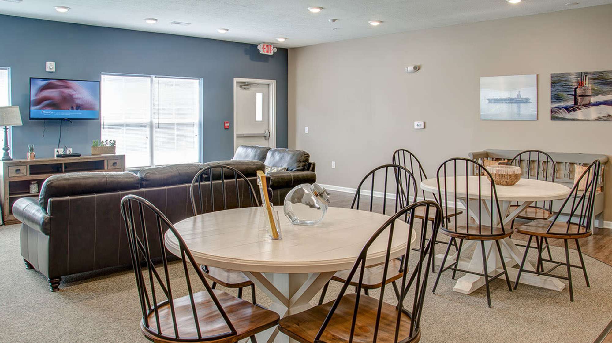Community room with a TV and a couch at Brennan Pointe I in Newport News, Virginia