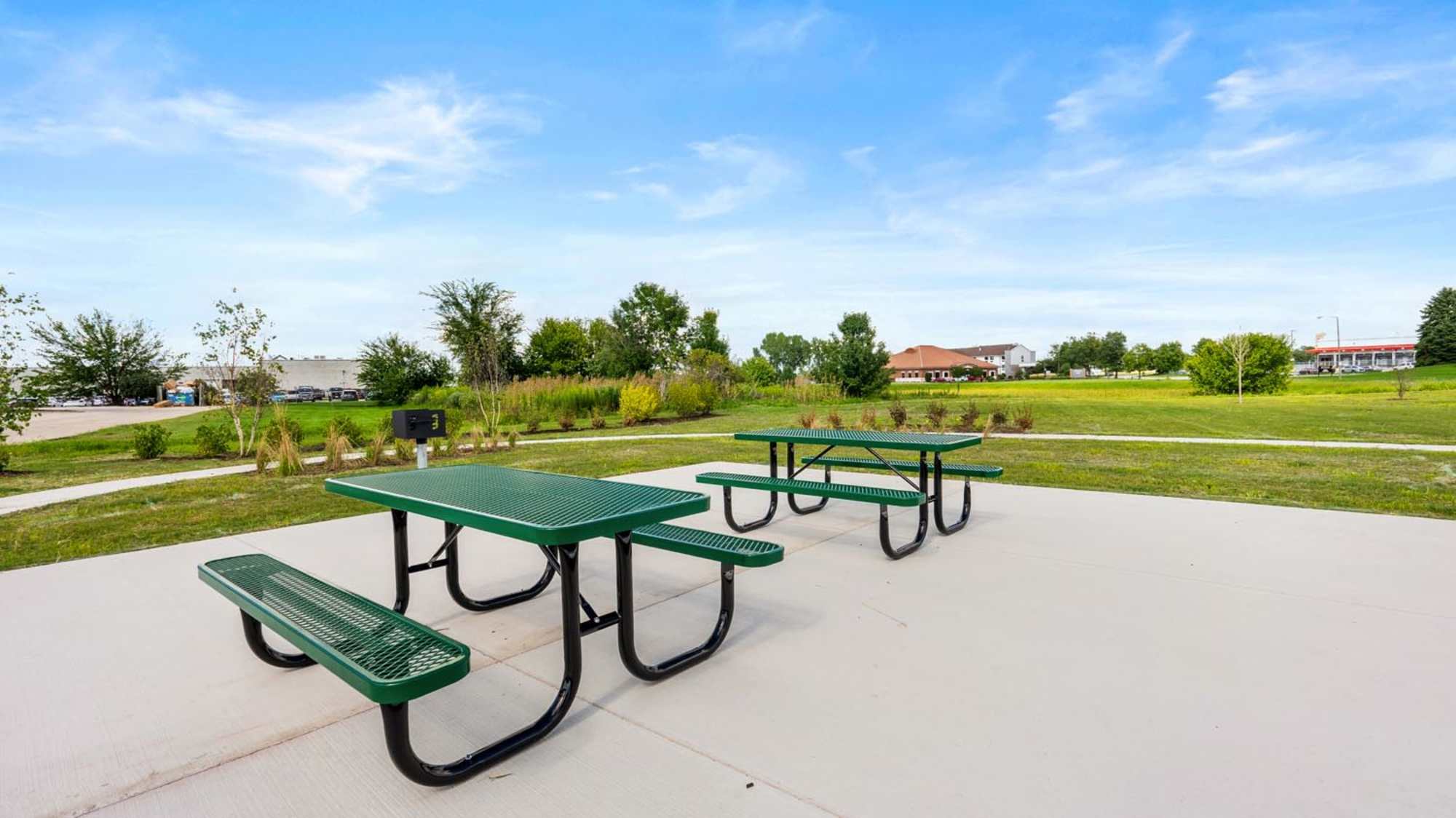 Outdoor seating space of community at Deville Manor in Oswego, Illinois