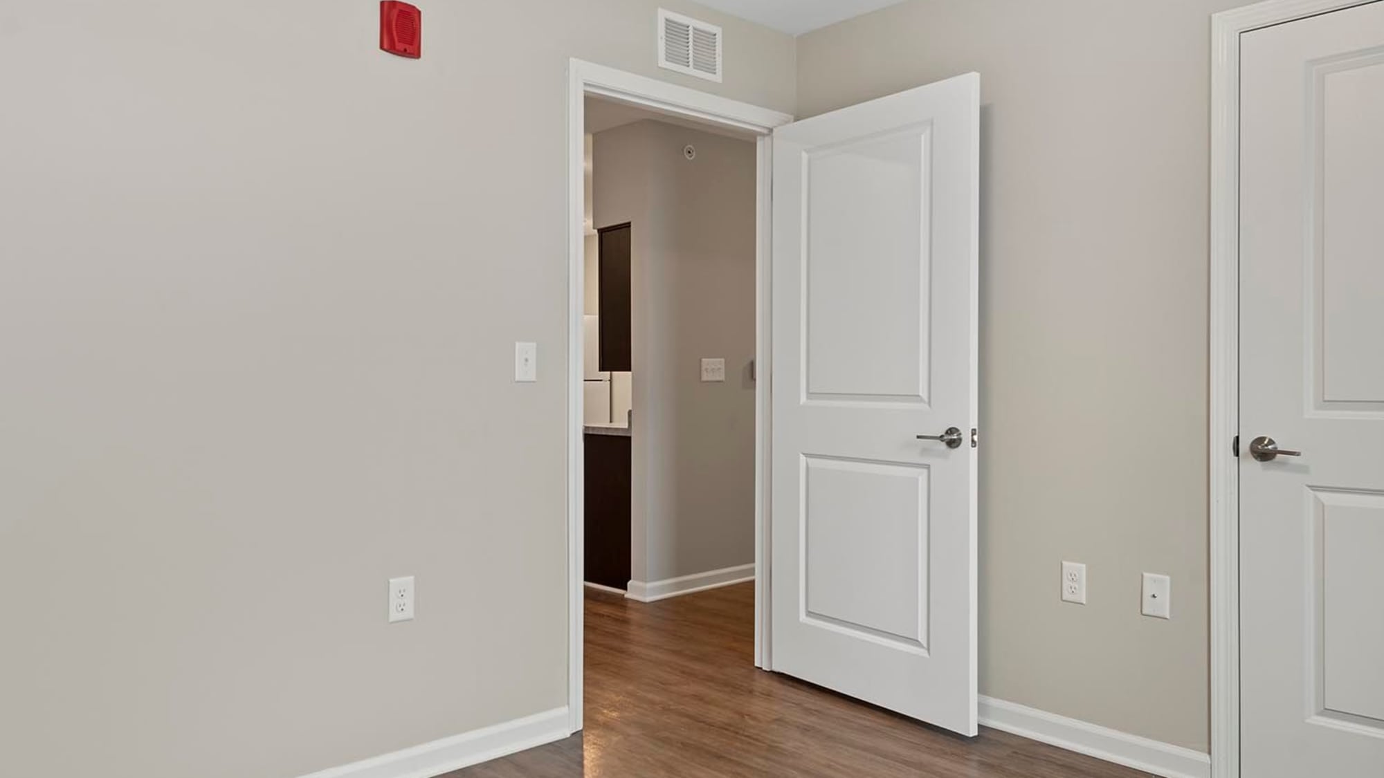 Bedroom with a lever door handles at Parker Glen in Champaign, Illinois