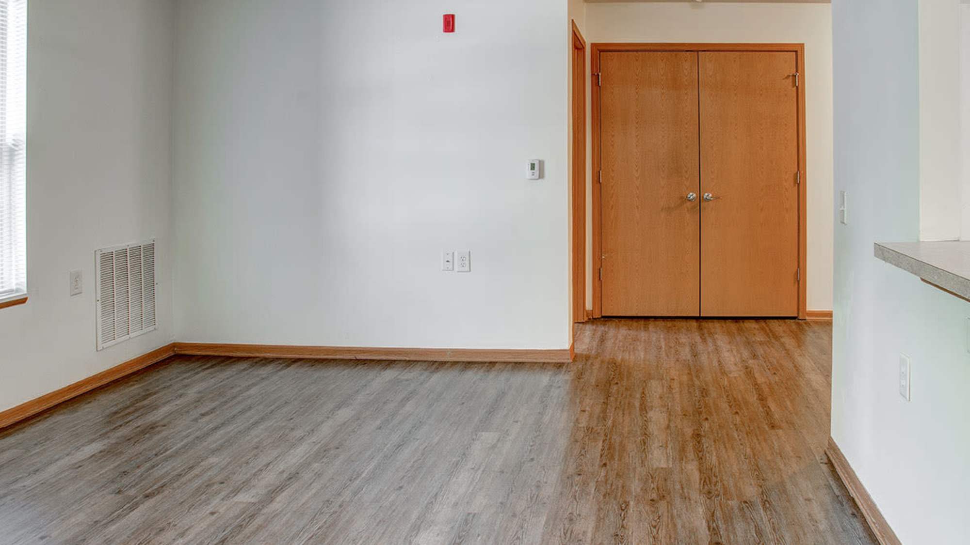 Well-lit living room with air conditioning at City View Place in Richmond, Virginia