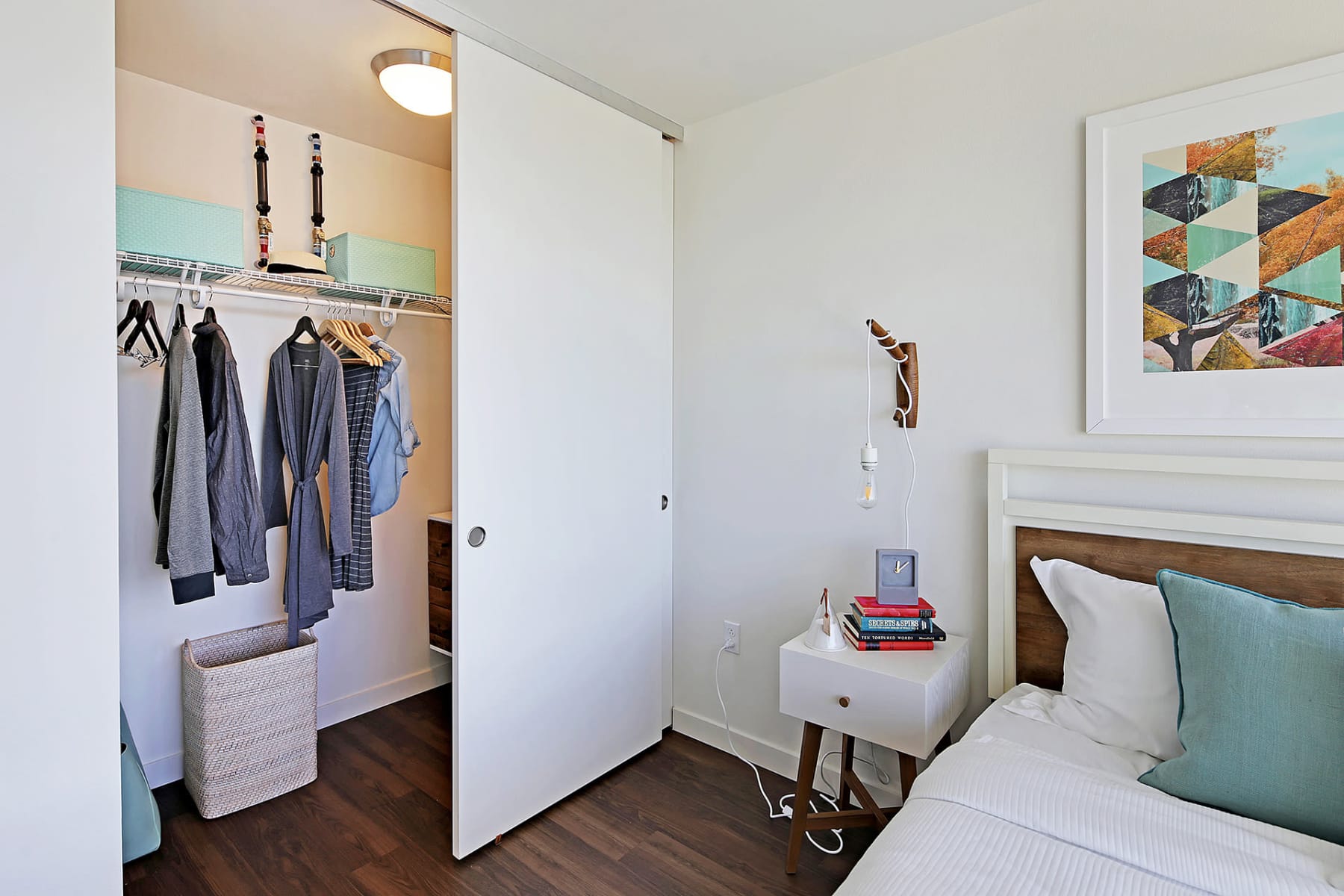 Closet in bedroom at Rooster Apartments in Seattle, Washington