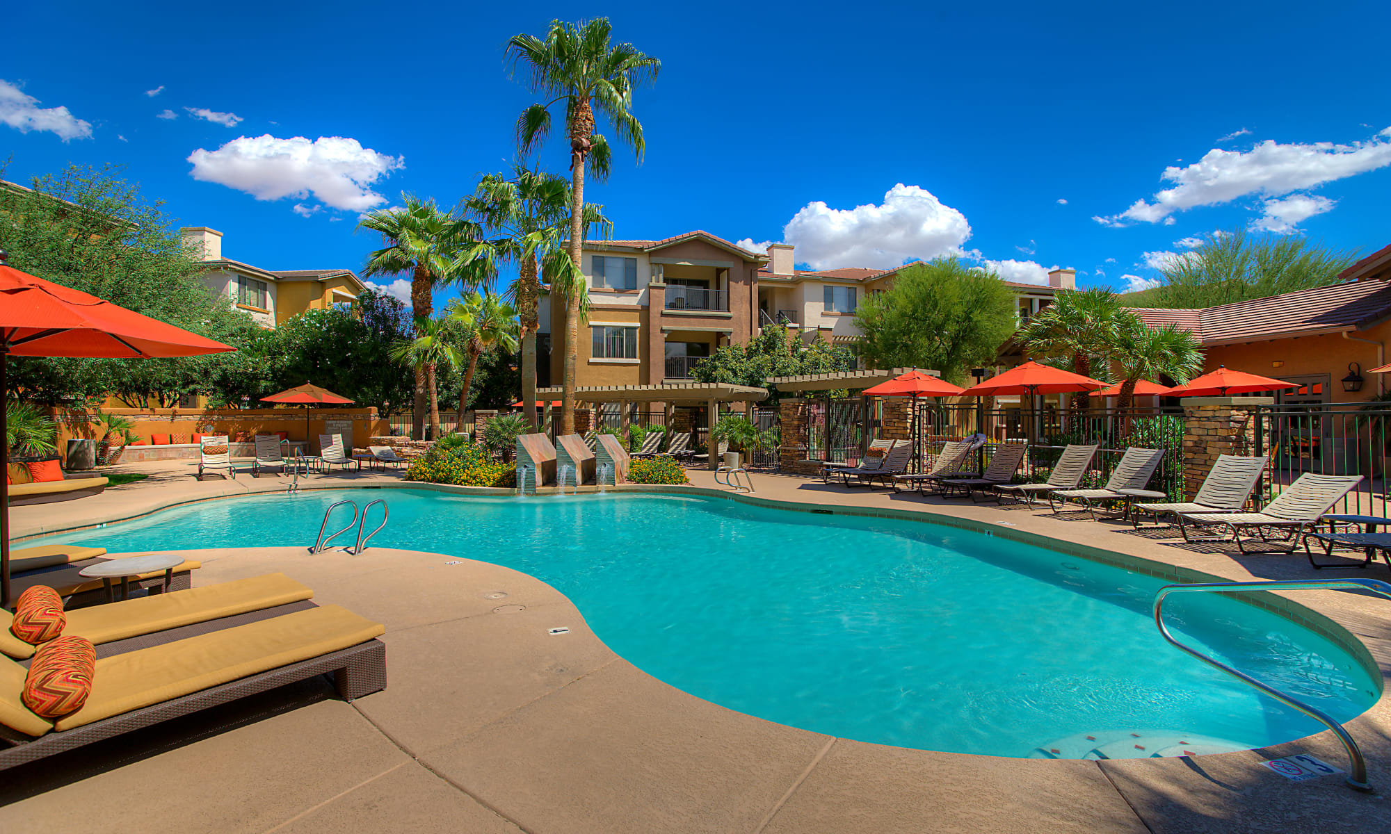 Sit by the pool at Borrego at Spectrum