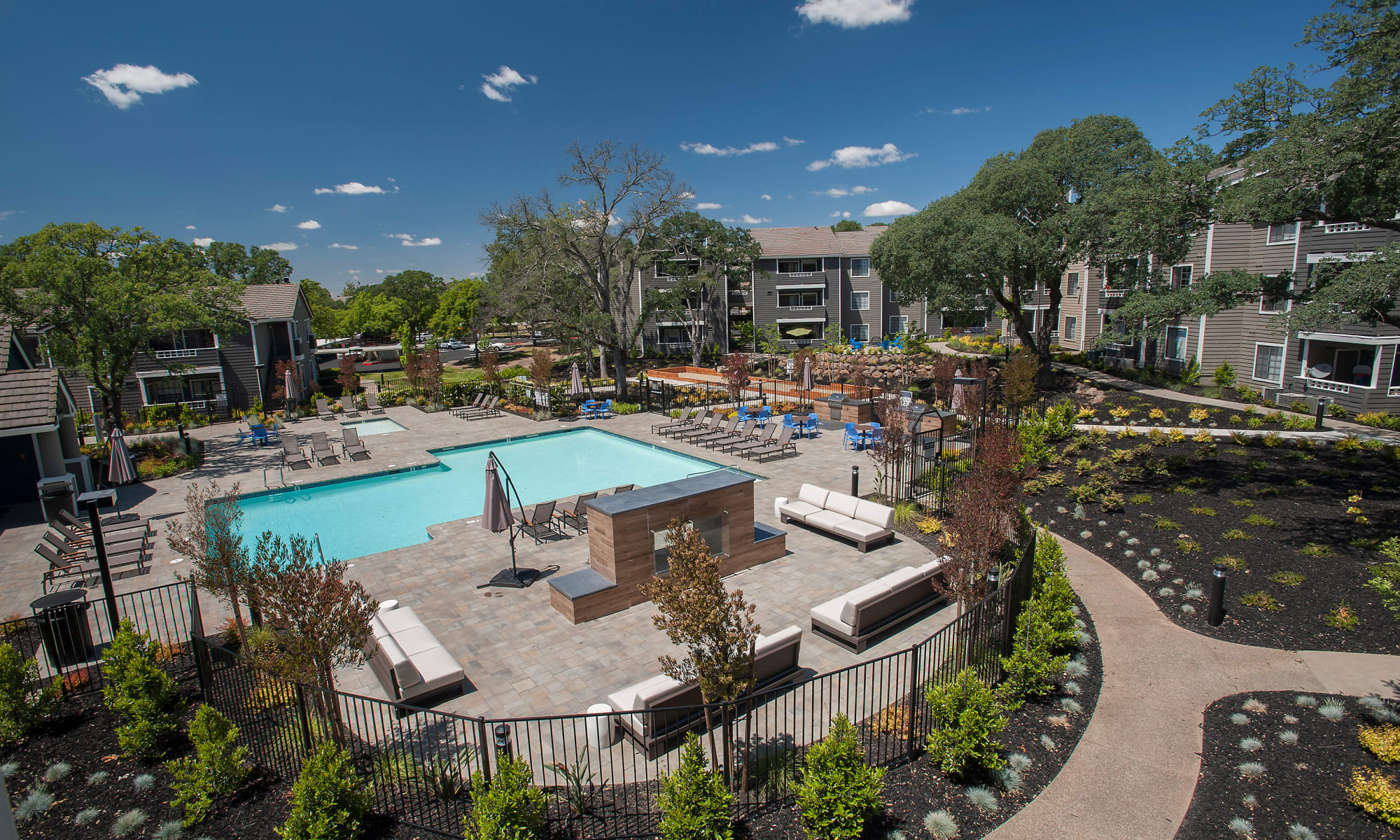 Beautiful landscaping and pool at Slate Creek Apartments in Roseville, California
