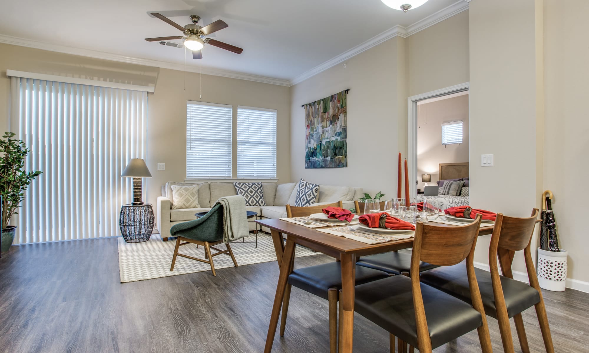 A beautifully decorated dining room and living room at Avilla Prairie Center in Brighton, Colorado