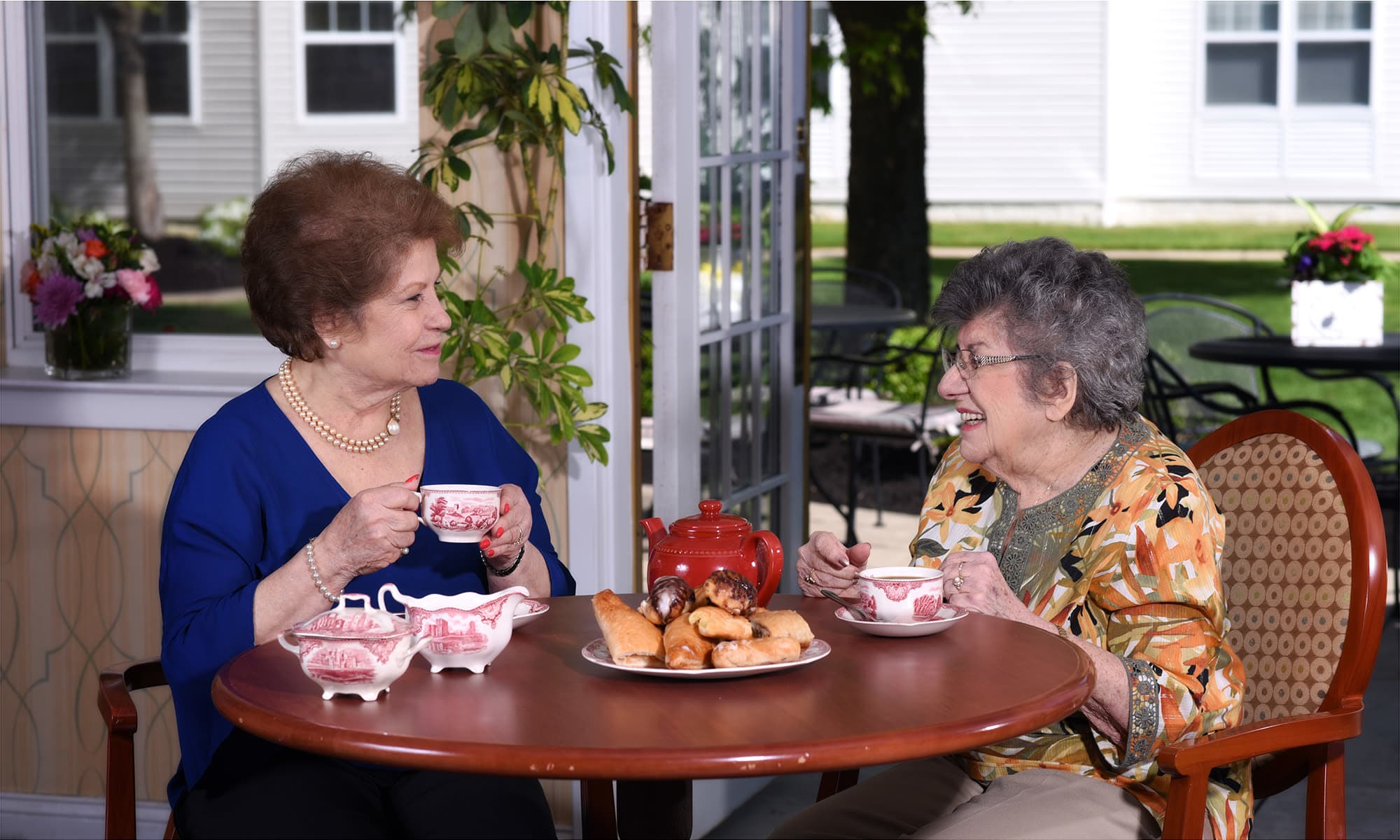 Residents catching up at Mattison Crossing at Manalapan Avenue in Freehold, New Jersey.
