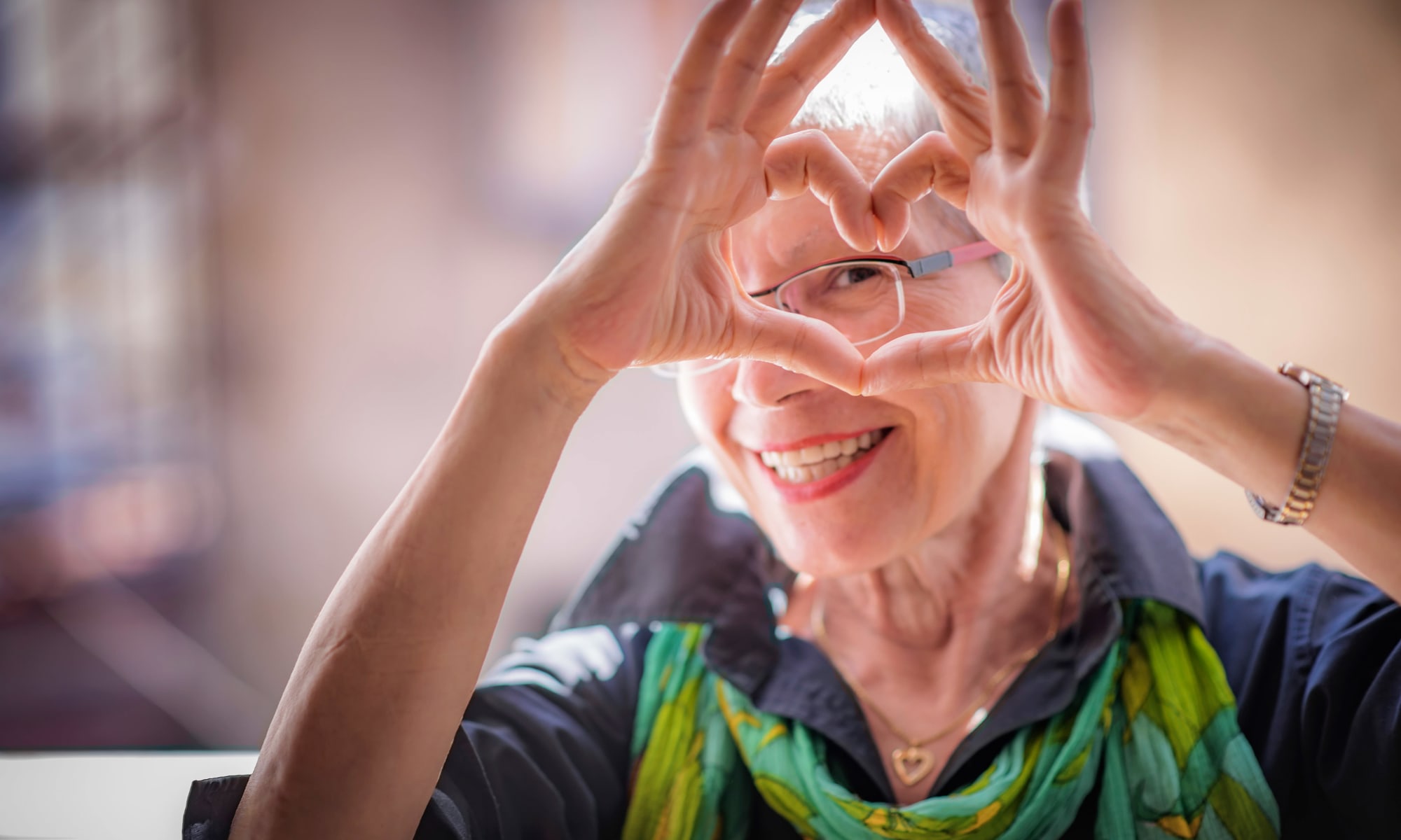 Resident posing for a photo at MacArthur Hills in Irving, Texas