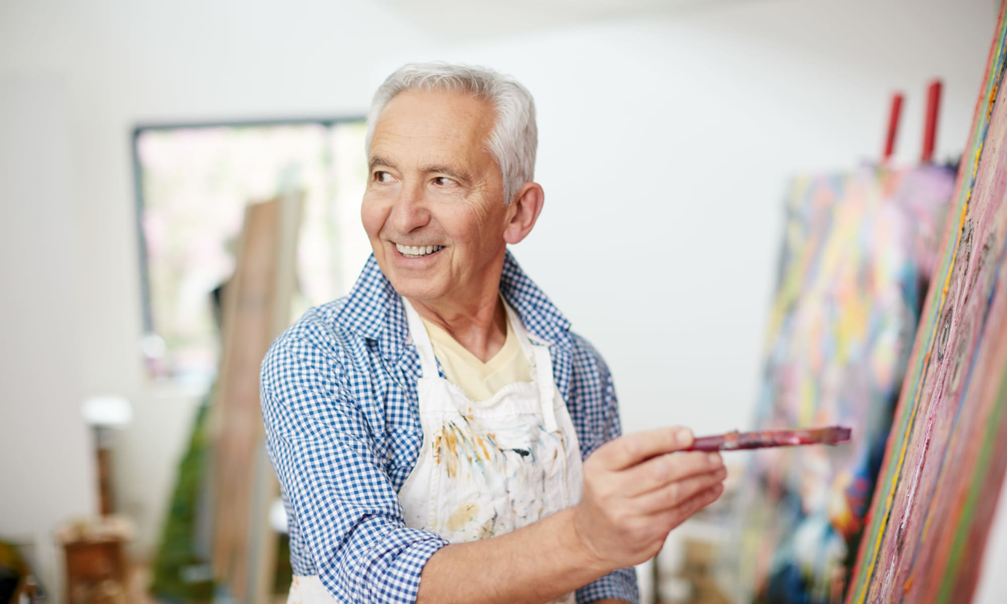 Resident painting at MacArthur Hills in Irving, Texas