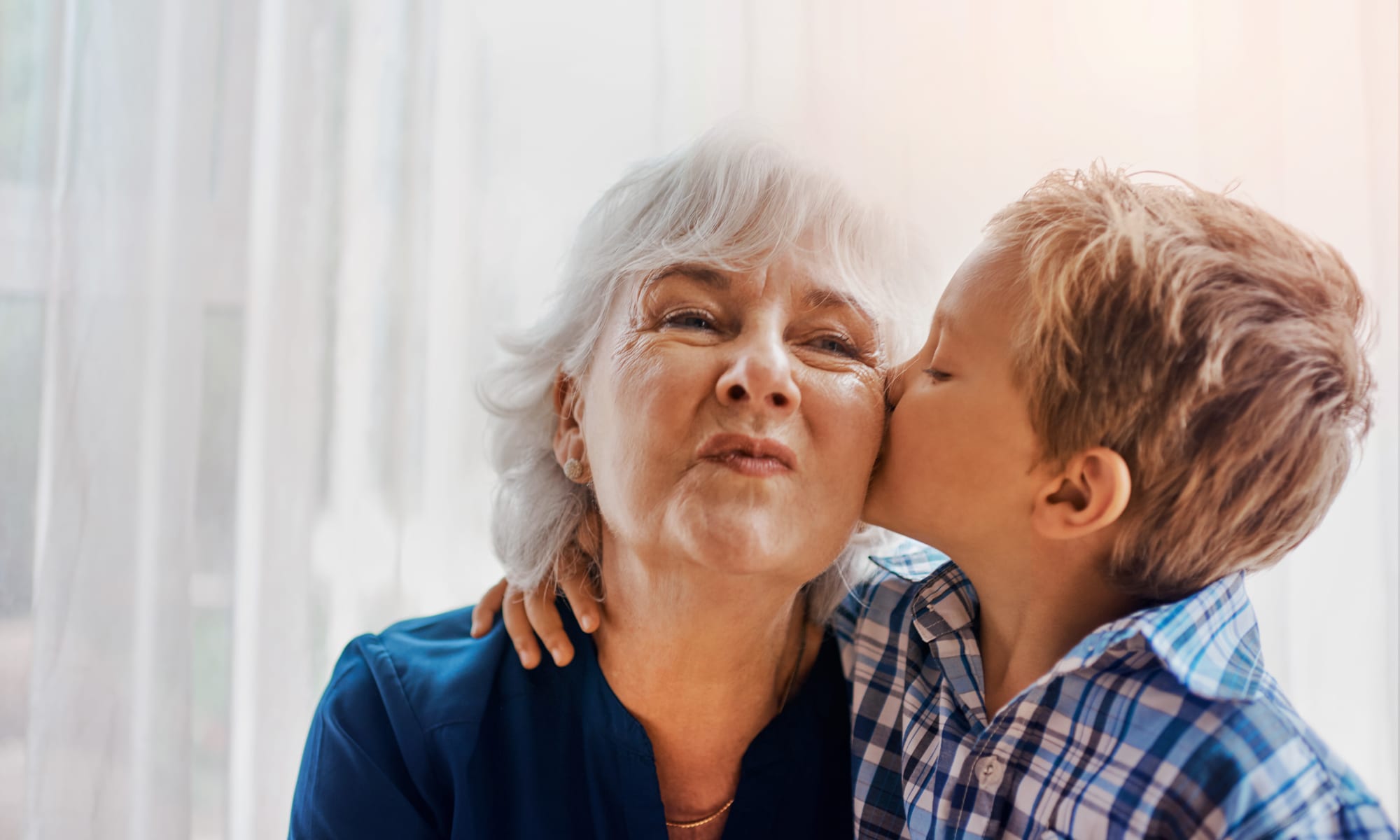 Resident with her grandson at MacArthur Hills in Irving, Texas
