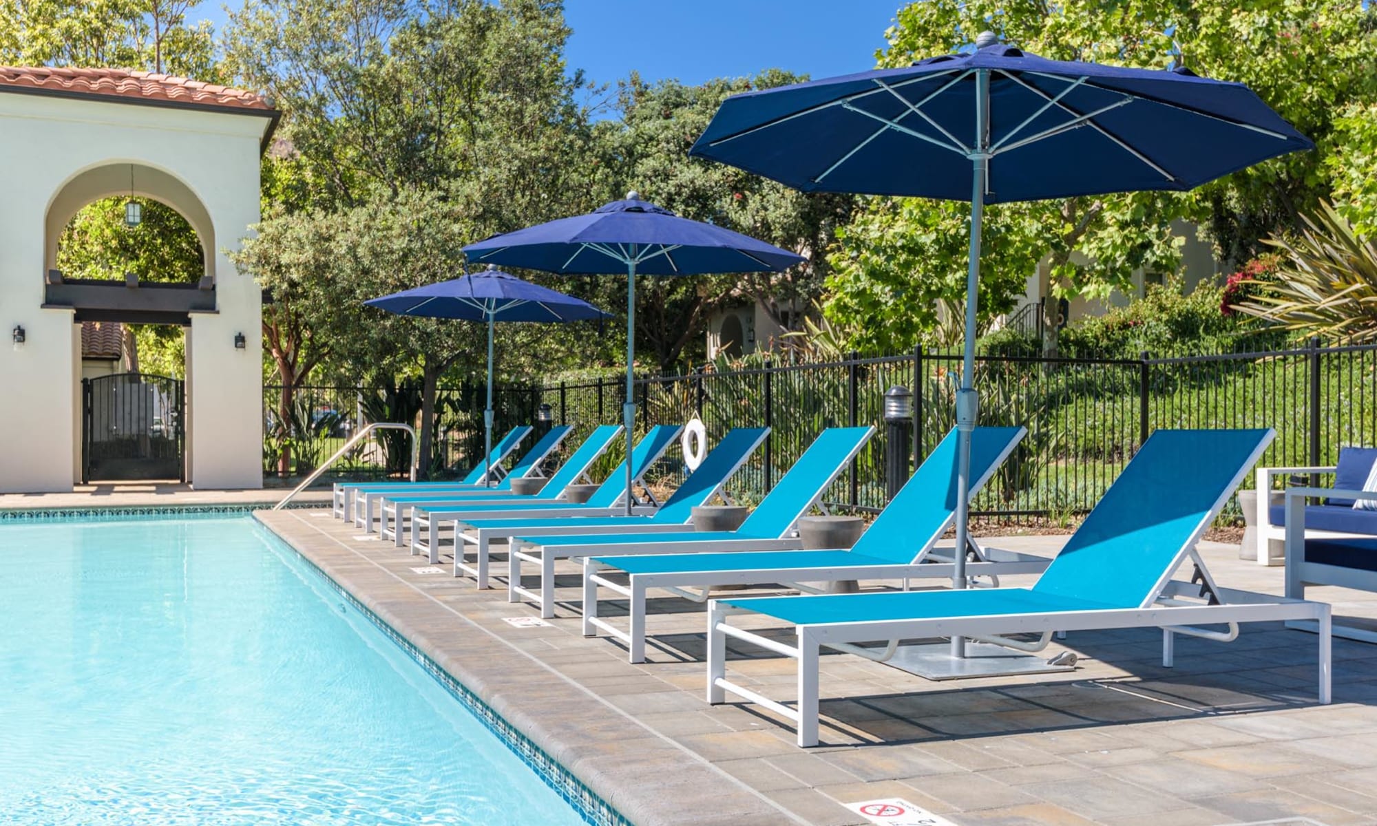 Chaise lounge chairs around the pool at Mission Hills in Camarillo, California