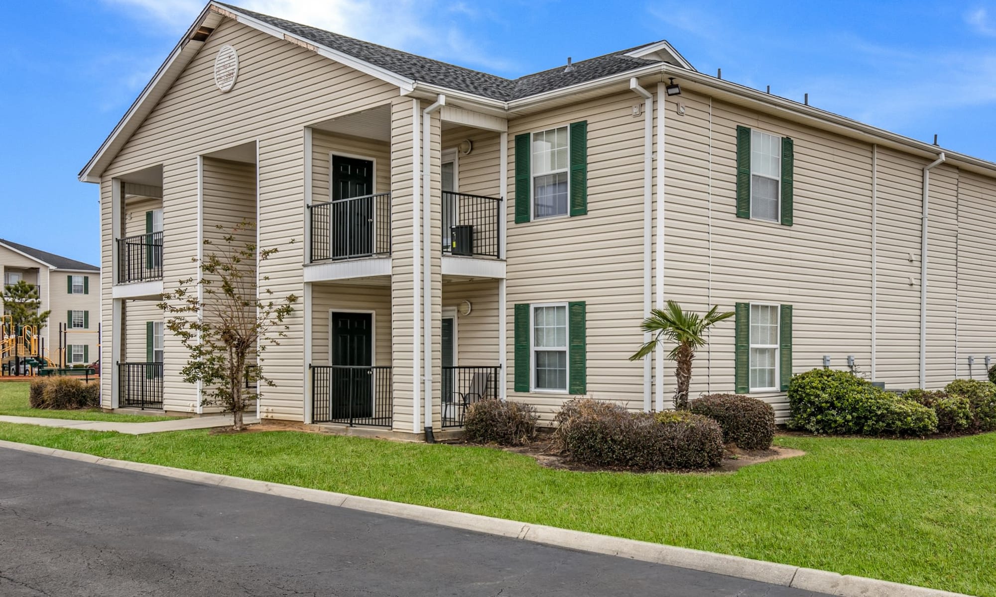 Beautifully landscaped apartments at Bayou Landing Apartments in Gulfport, Mississippi