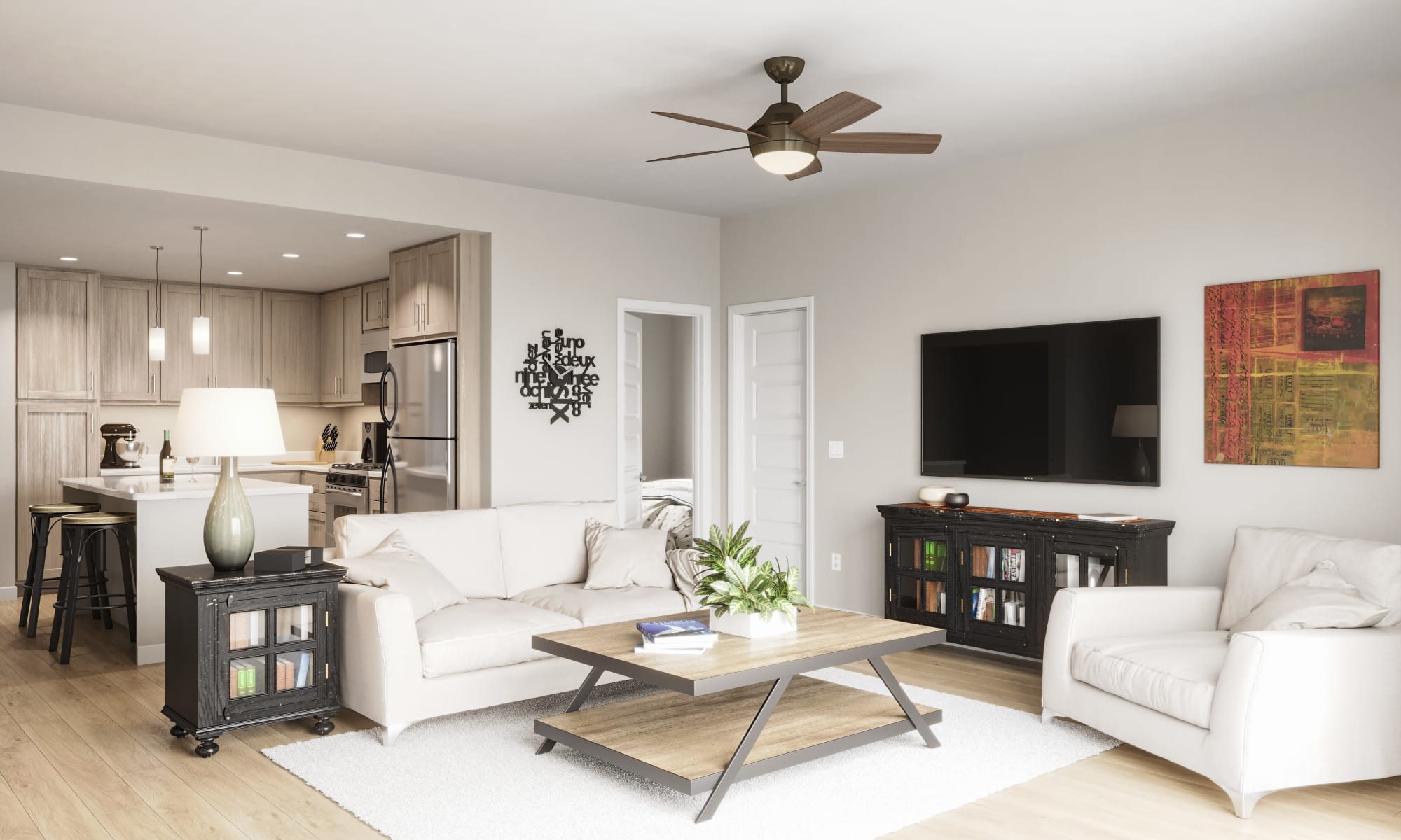 In unit view of the kitchen & living room at Estia Surprise Farms in Surprise, Arizona