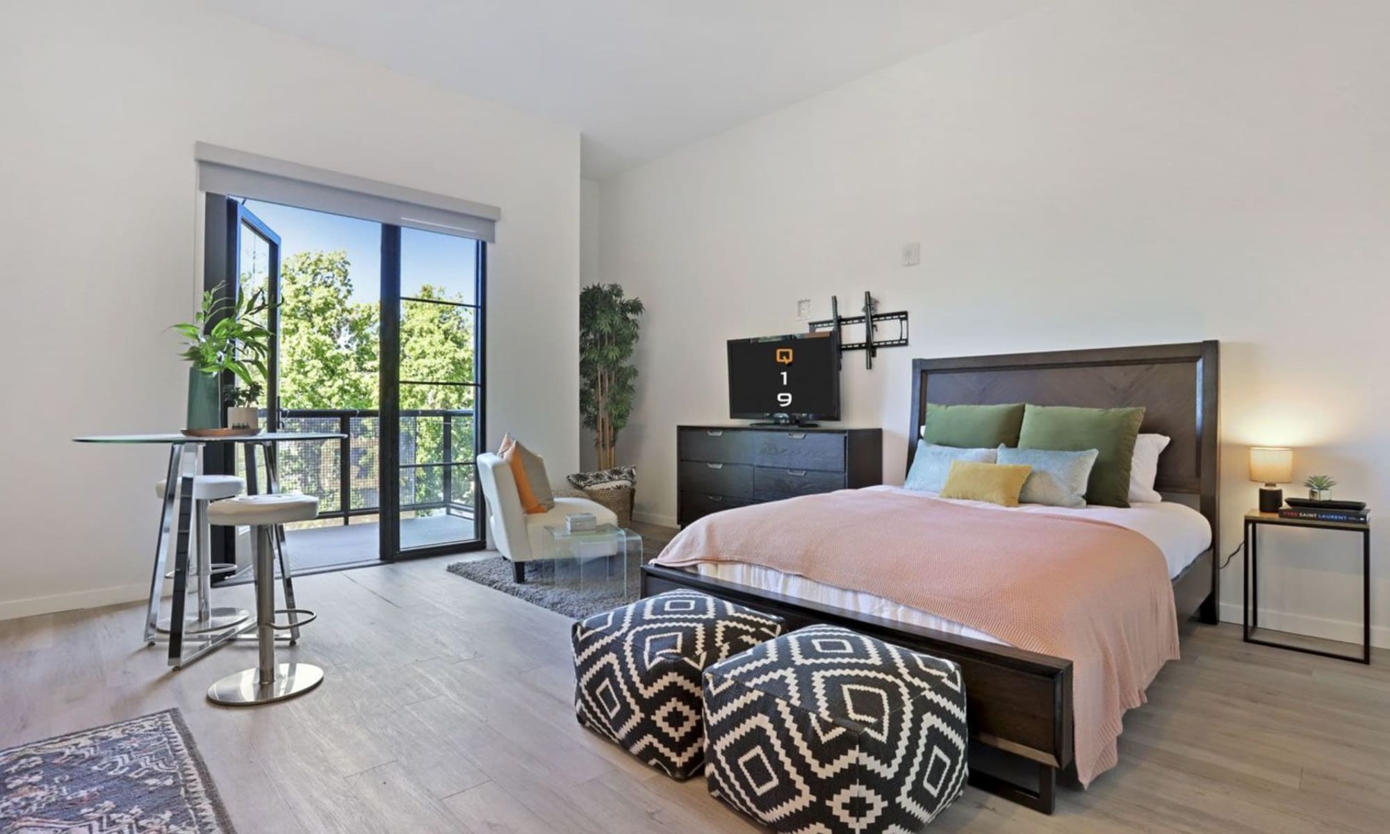 well lit bedroom at Q19 Apartments in Sacramento, California