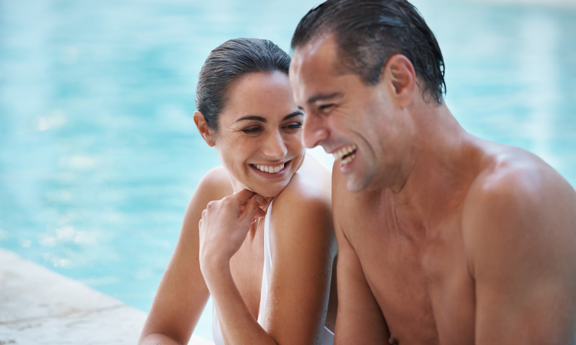 Two residents enjoying the pool at Bocora in Boca Raton, Florida