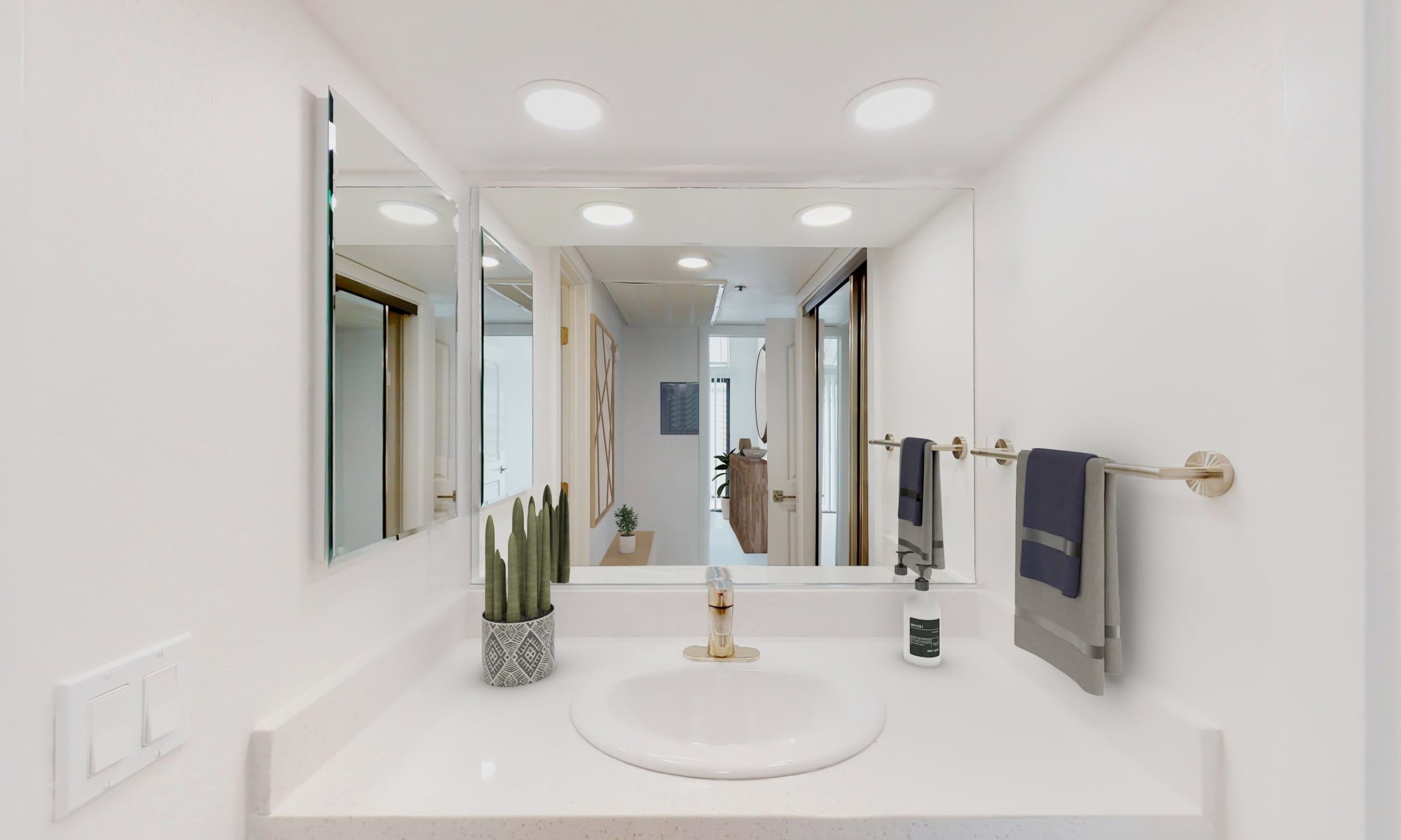 Well-lit bathroom in Sendero one-bedroom 