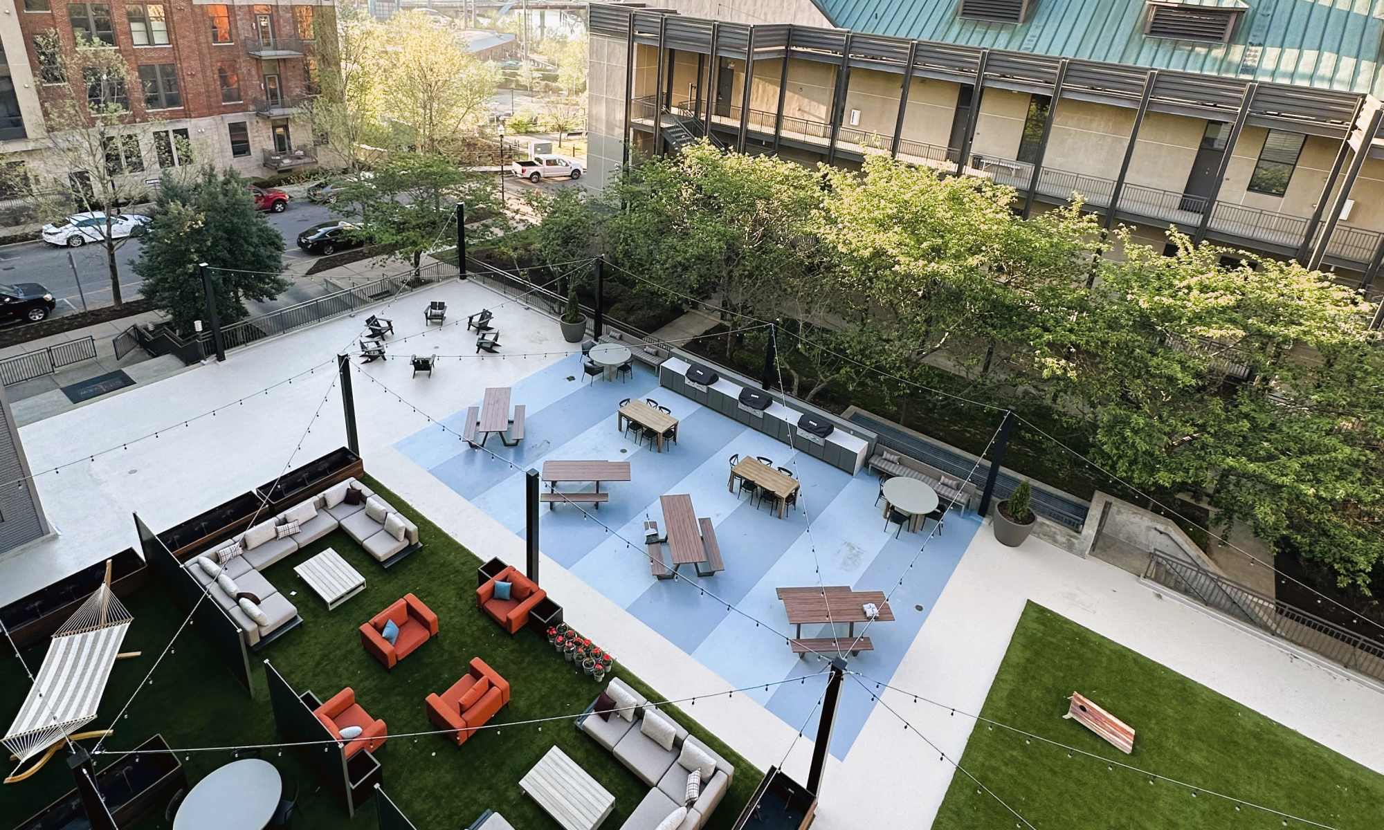 Outdoor resident seating area with large couches at City View Apartments in Nashville, Tennessee