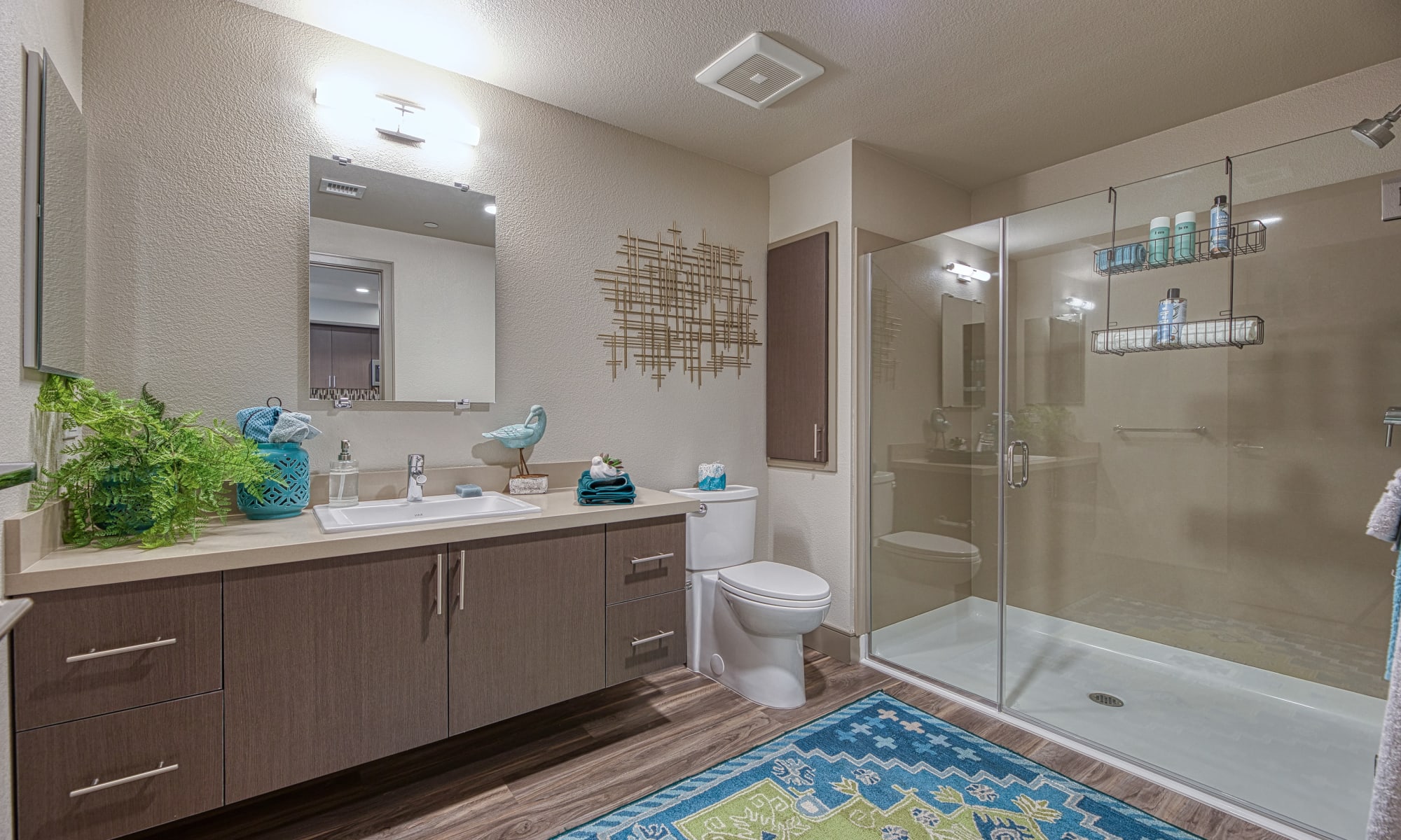 Vespaio in San Jose, California features a bathroom with glass doored shower.