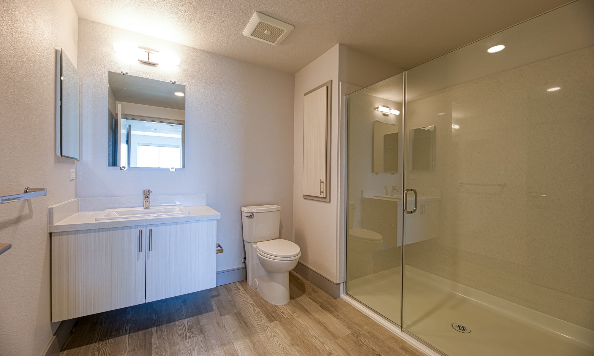 Bathroom featuring glass doored shower at Vespaio in San Jose, California