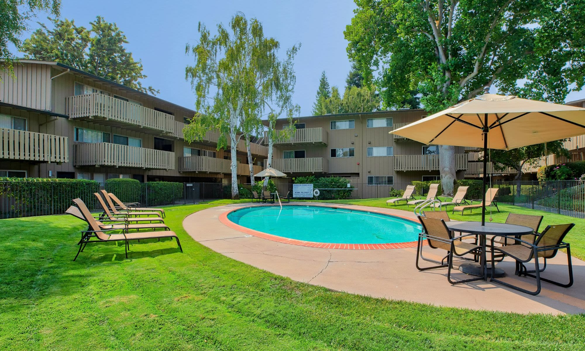 Pool area at Stanford Villa Apartment Homes in Palo Alto, California