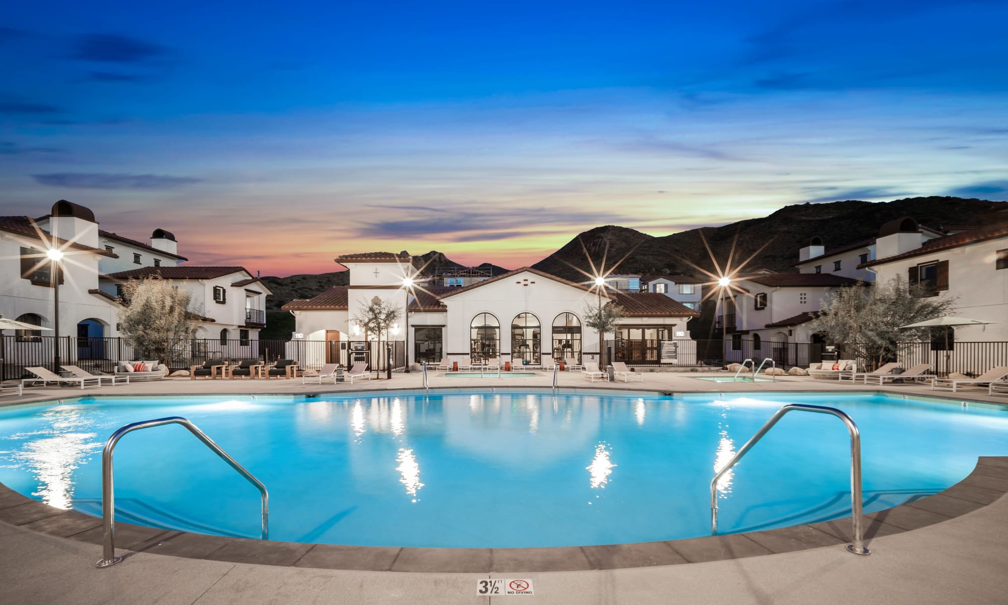 A beautiful view of the pool as the sun sets at The Villas at Anacapa Canyon in Camarillo, California
