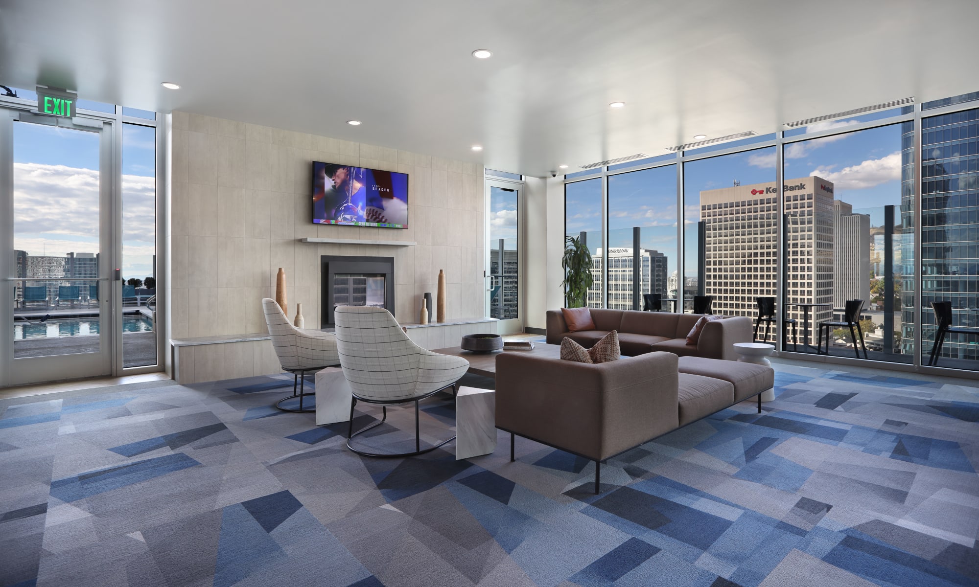 Rooftop clubroom with fireplace and television of Liberty SKY in Salt Lake City, Utah